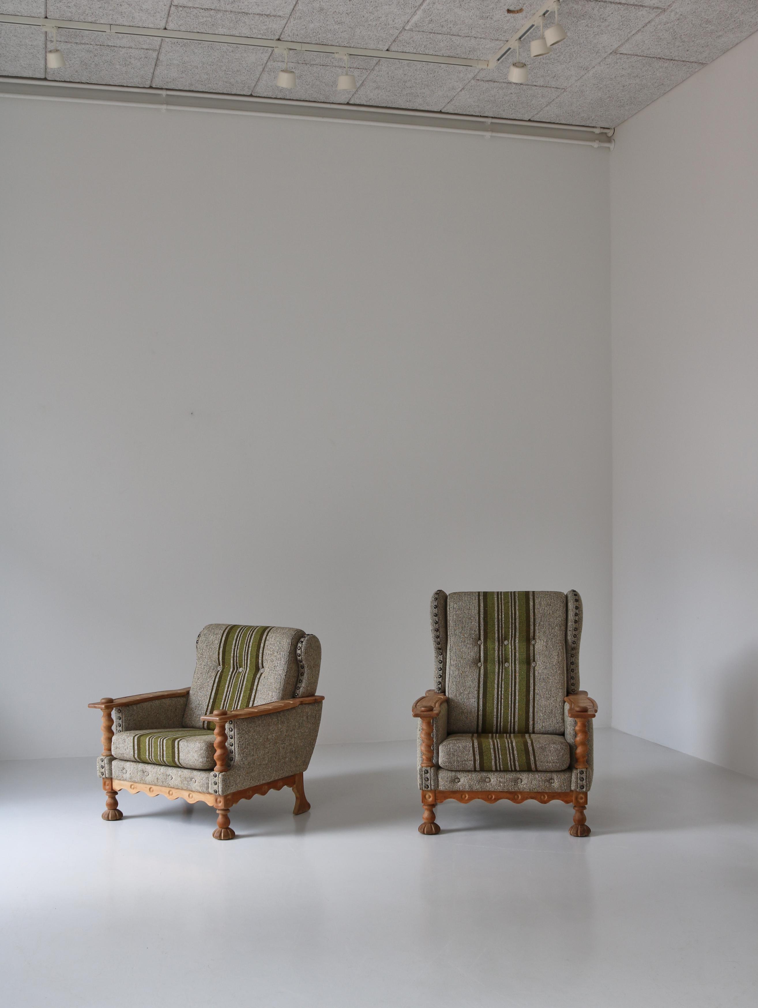 A pair of playful Scandinavian Modern wingback easy chairs attributed to Danish designer Henning Kjærnulf. The set consist of a highback and a lower chair. The chairs are vintage and was made in the 1960s. They are solid and sturdy and mixes modern