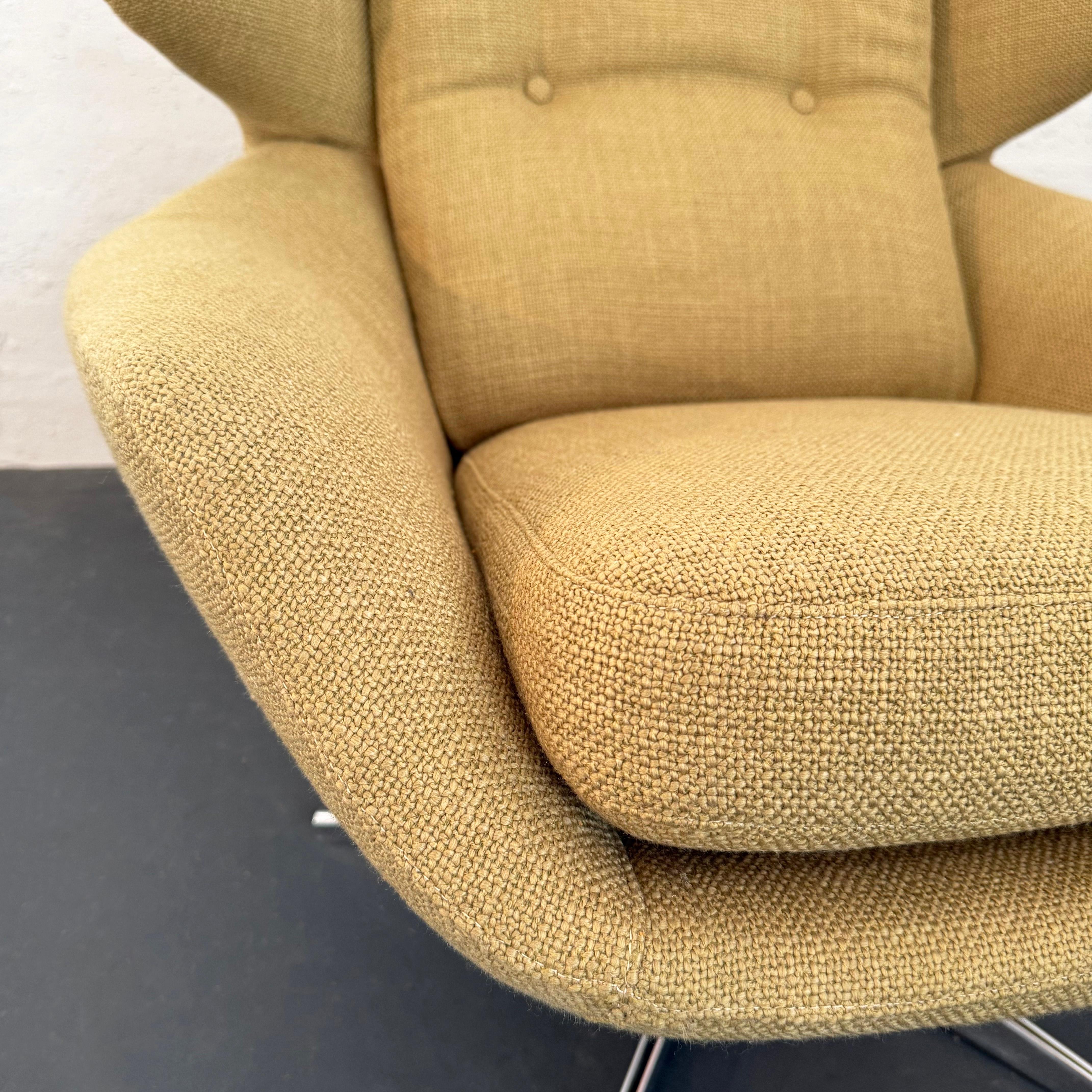 Sillón giratorio escandinavo moderno Wingback Egg Tela en venta