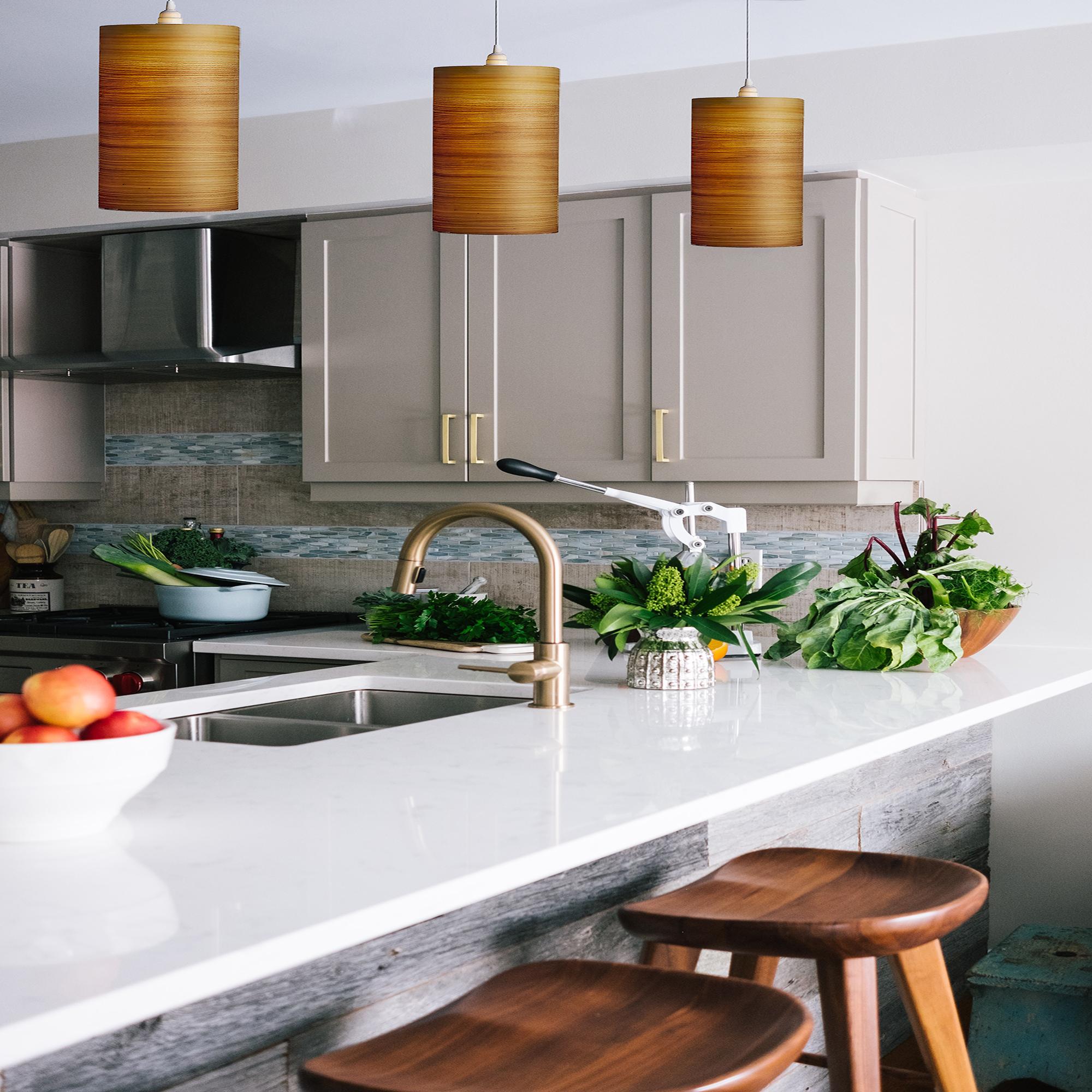 CENTA is a contemporary, Mid-Century Modern light fixture. This is a minimalist luxury pendant design and can be exhibited in dining rooms, entryways, alcoves, and over kitchen islands. This Limited-Edition piece is made with cypress wood. This rare