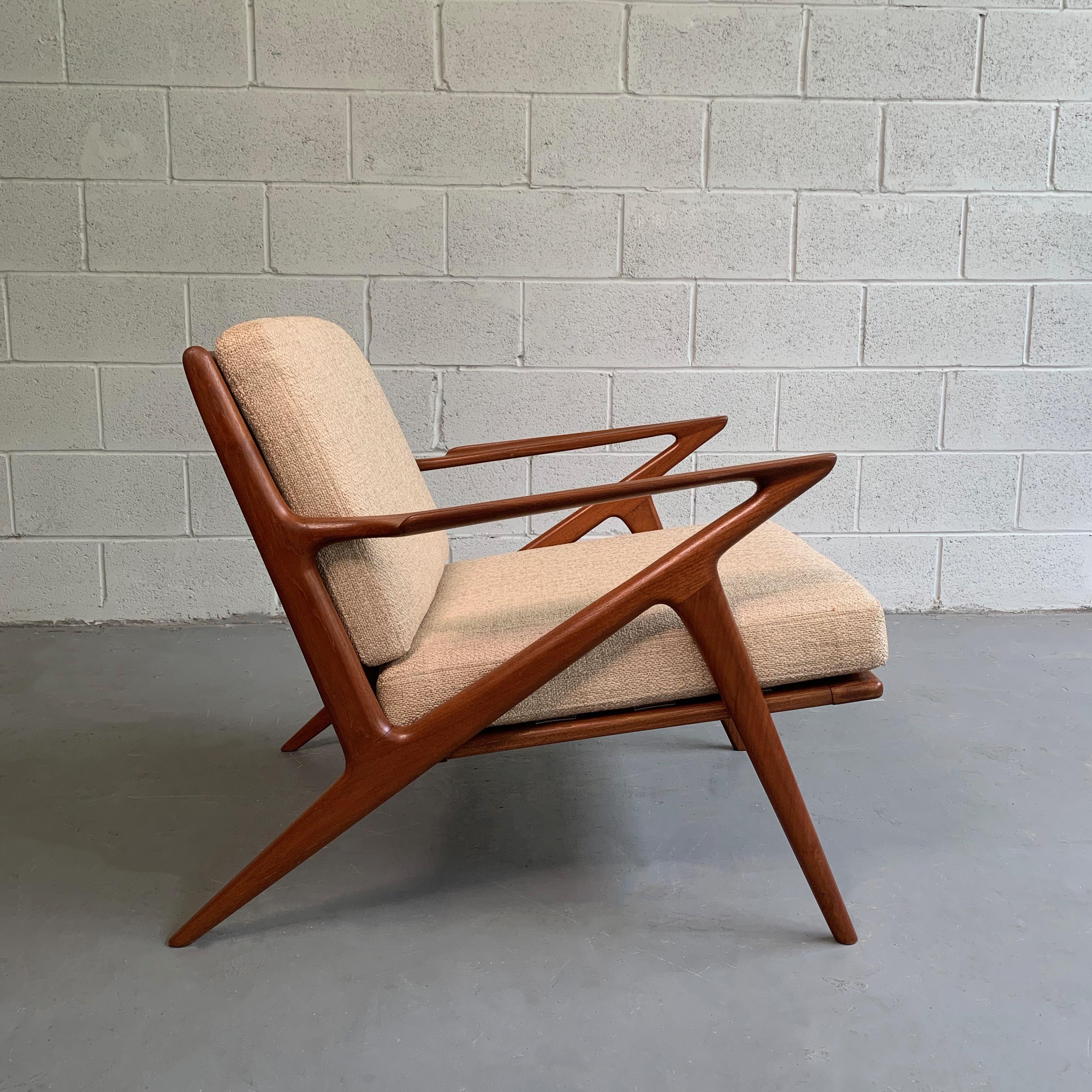 Classic, Danish Modern, slat-back, Z lounge chair by Poul Jensen, Denmark has a newly refinished teak frame and oatmeal cotton blend upholstered seat and back.