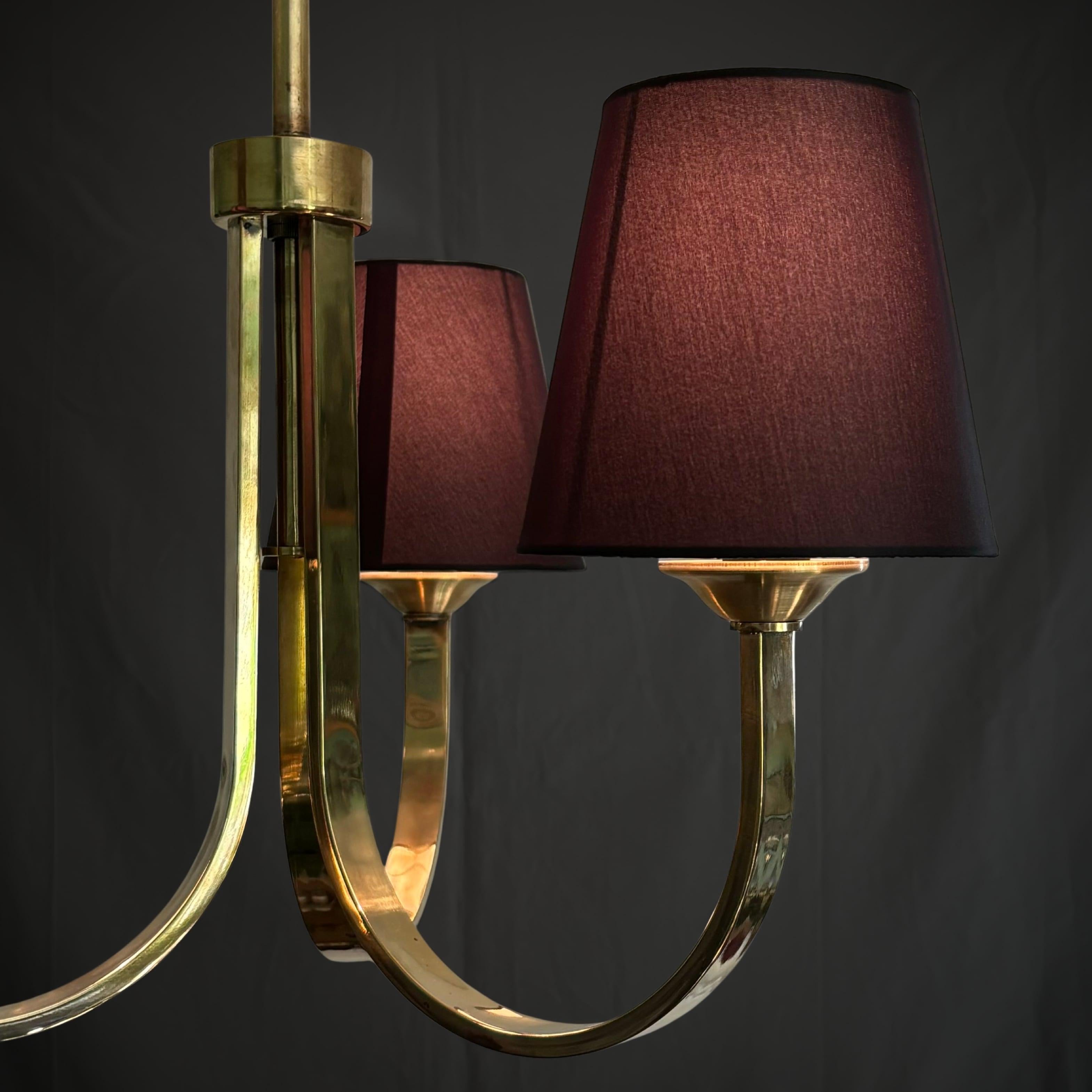 Ottone Lampadario modernista scandinavo in ottone con tre paralumi neri, Danimarca, anni '30 in vendita