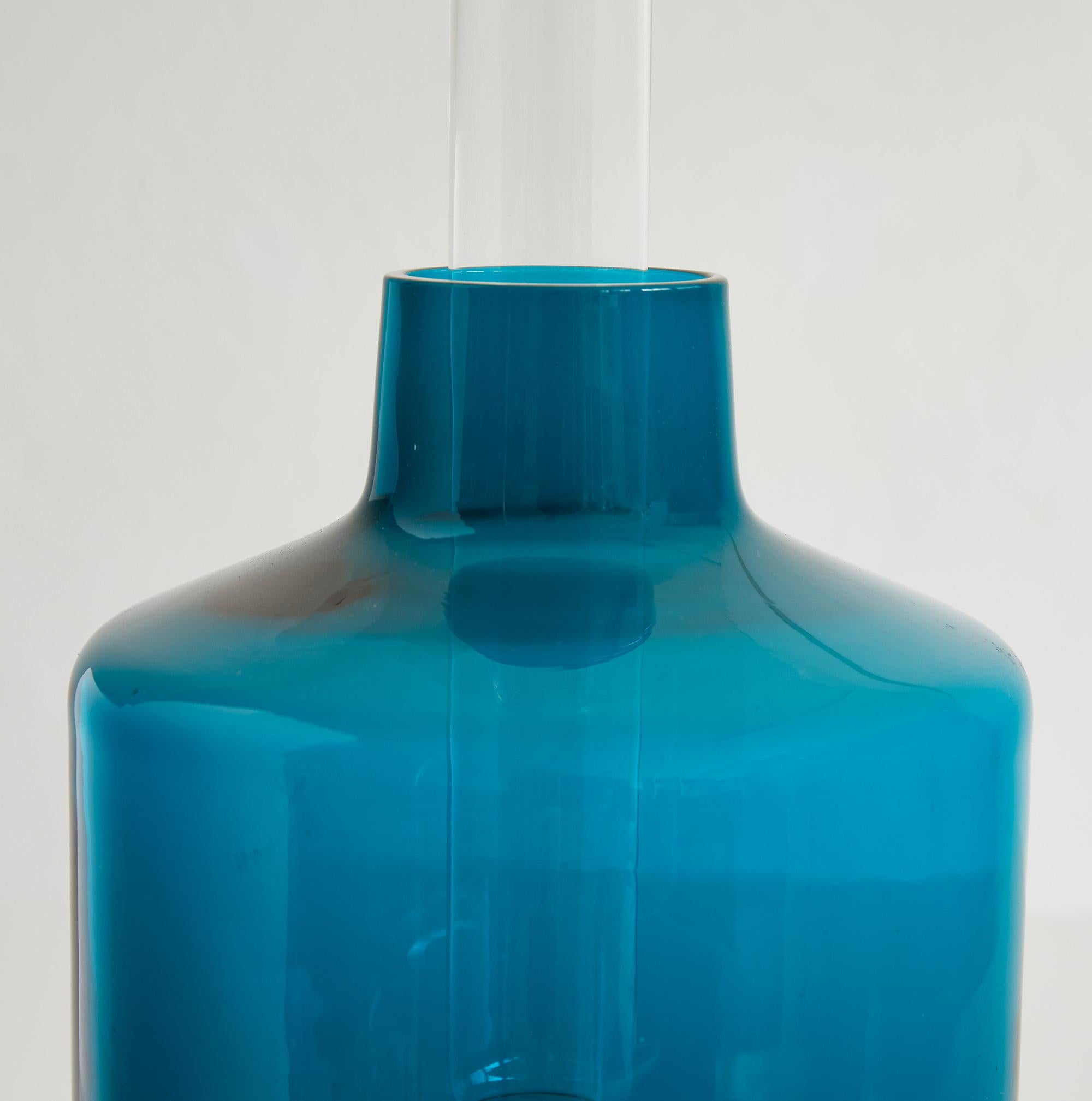 Early modernist  L47 oil lamp designed by Swedish designer Hans-Agne Jakobsson reputated for his refined mid century modern lighting designs.  

This gorgeous piece has been manufactured by Markaryd AB, Sweden around 1960

The lamp boasts a circular
