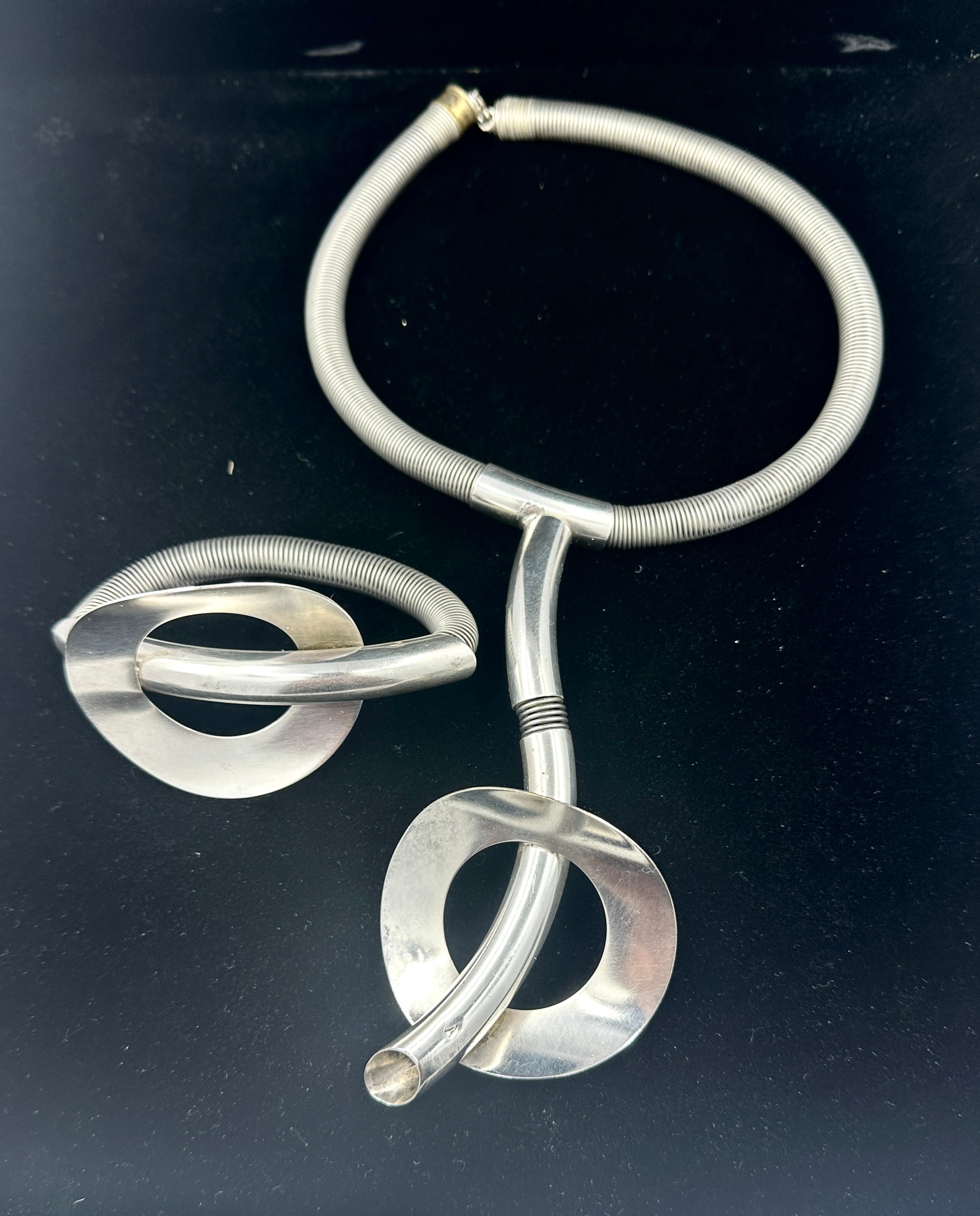 This is a stunning Mid-Century Modernist Necklace and Bracelet with a space age sputnik rings of Saturn theme.  The magnificent pieces of Art Jewelry were purchased in Iceland.  They are most likely Scandinavian, possibly from Iceland, Norway,