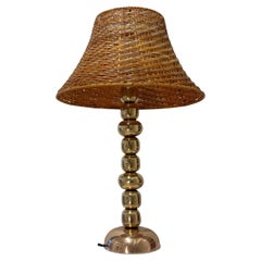 Scandinavian modernist table lamp, brass spheres and rattan, Sweden, 1960s