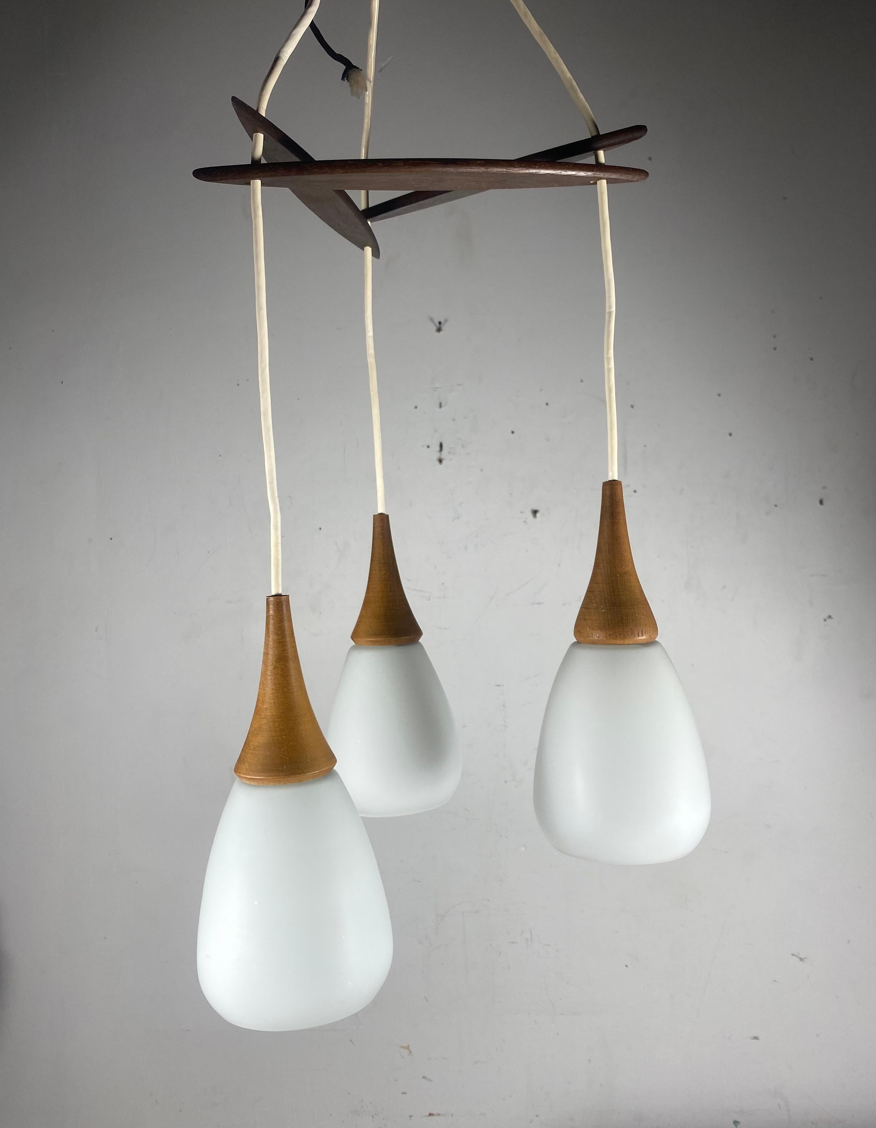 Scandinavian Modernist Triple Pendant Lighting.. Teak and Glass