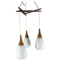 Scandinavian Modernist Triple Pendant Lighting.. Teak and Glass.. Holmgaard
