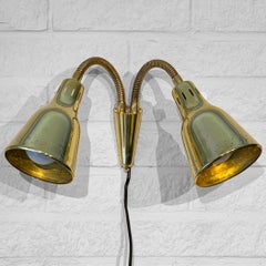 Scandinavian modernist wall lamp in brass, Pagos model 6744, Sweden, 1940s