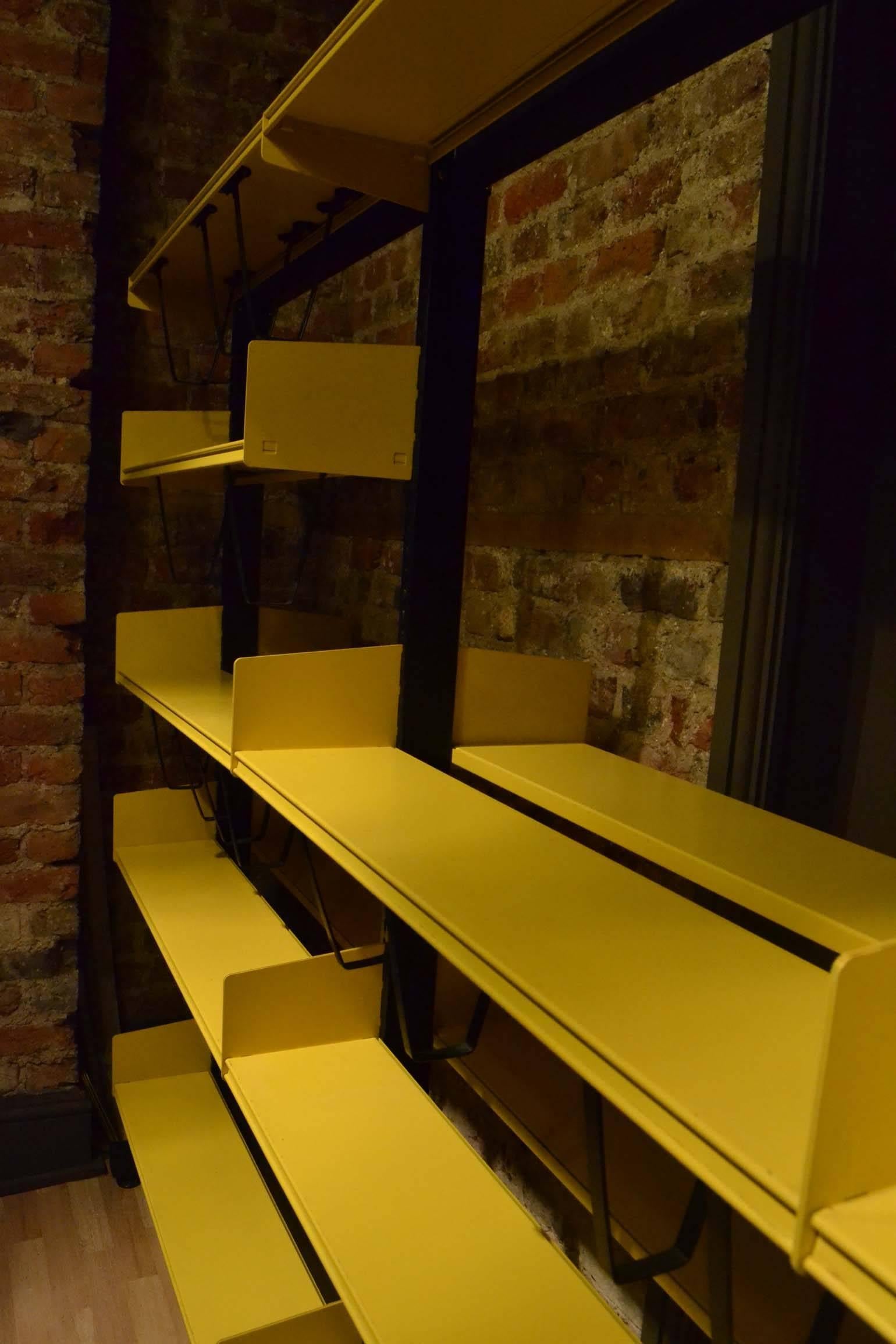 yellow metal bookcase