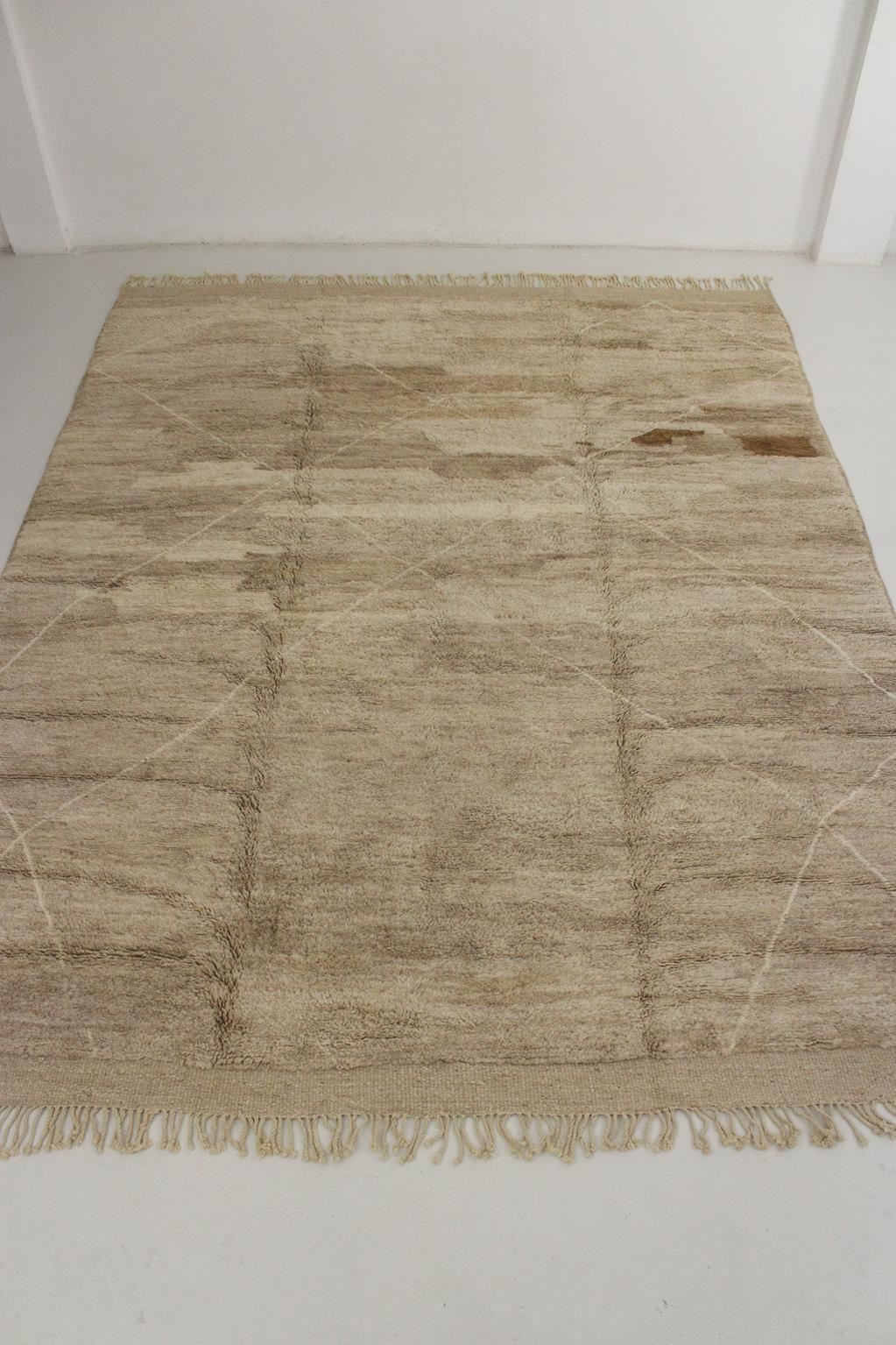 I had this modern-style, original Mrirt rug made by weavers artisans in the area of Khenifra, Atlas Mountains, Morocco. Groups of women there still weave by hand on traditional, vertical looms to make these new rugs!

Several tones of light brown,