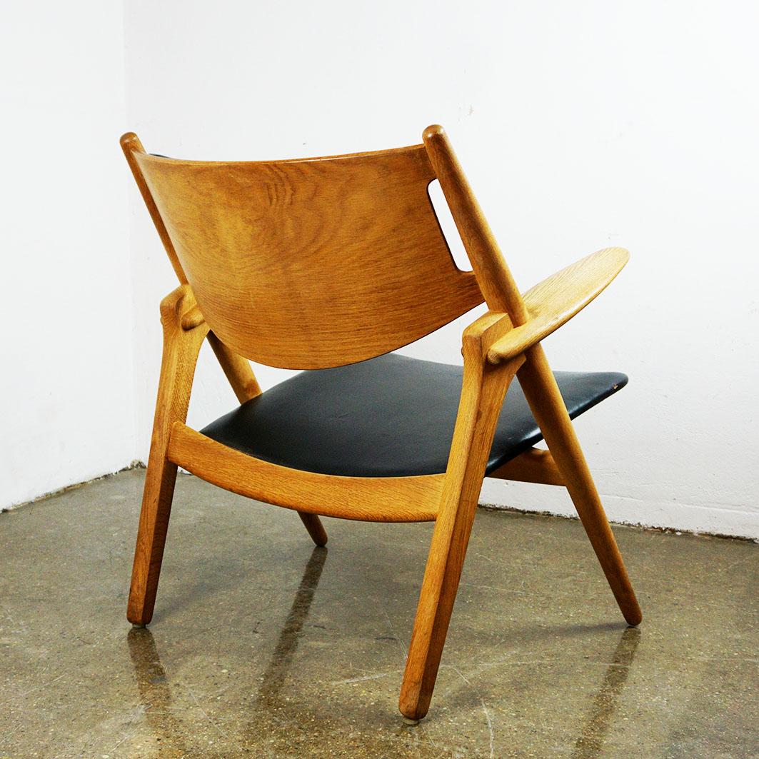Scandinavian Oak and Black Leather CH28 Chair by Hans Wegner for Carl Hansen 4