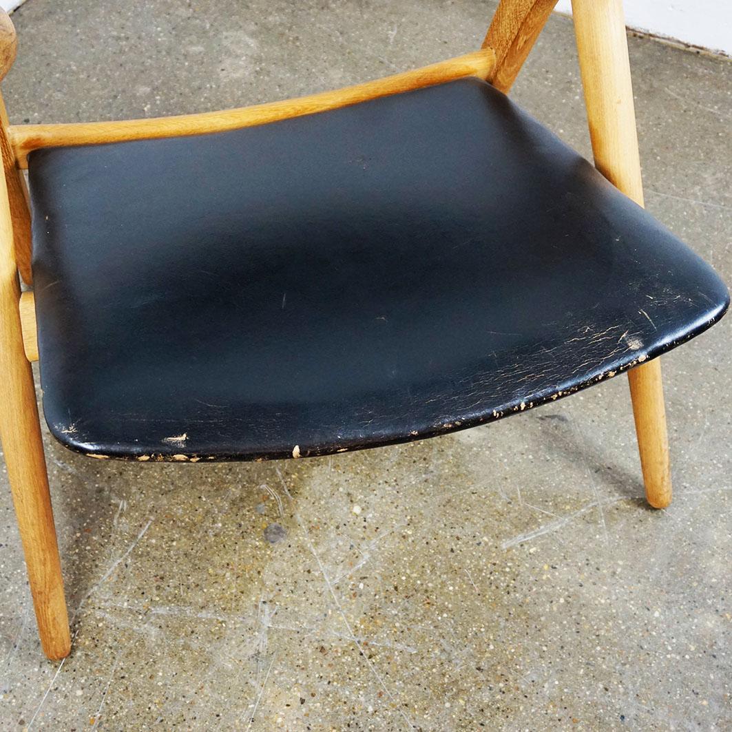 Scandinavian Modern Scandinavian Oak and Black Leather CH28 Chair by Hans Wegner for Carl Hansen