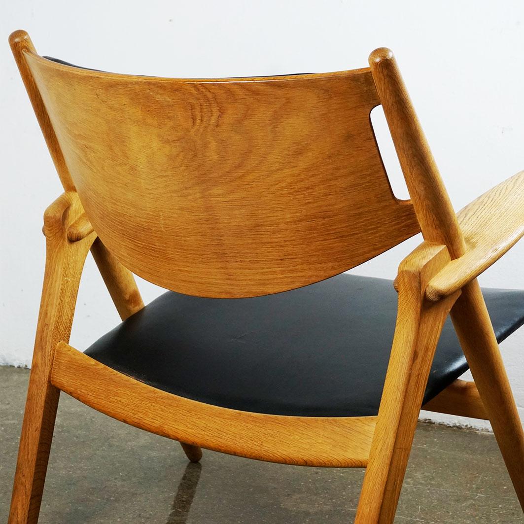 Scandinavian Oak and Black Leather CH28 Chair by Hans Wegner for Carl Hansen 3