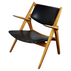 Scandinavian Oak and Black Leather CH28 Chair by Hans Wegner for Carl Hansen