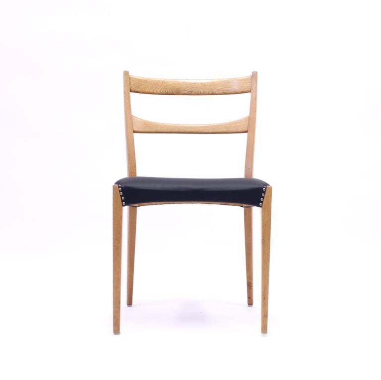 Scandinavian Oak Dining Chairs with Black Leather Seats, 1950s For Sale