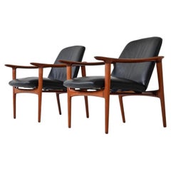Scandinavian pair of lounge chairs in teak and leather Westnofa Norway 1960
