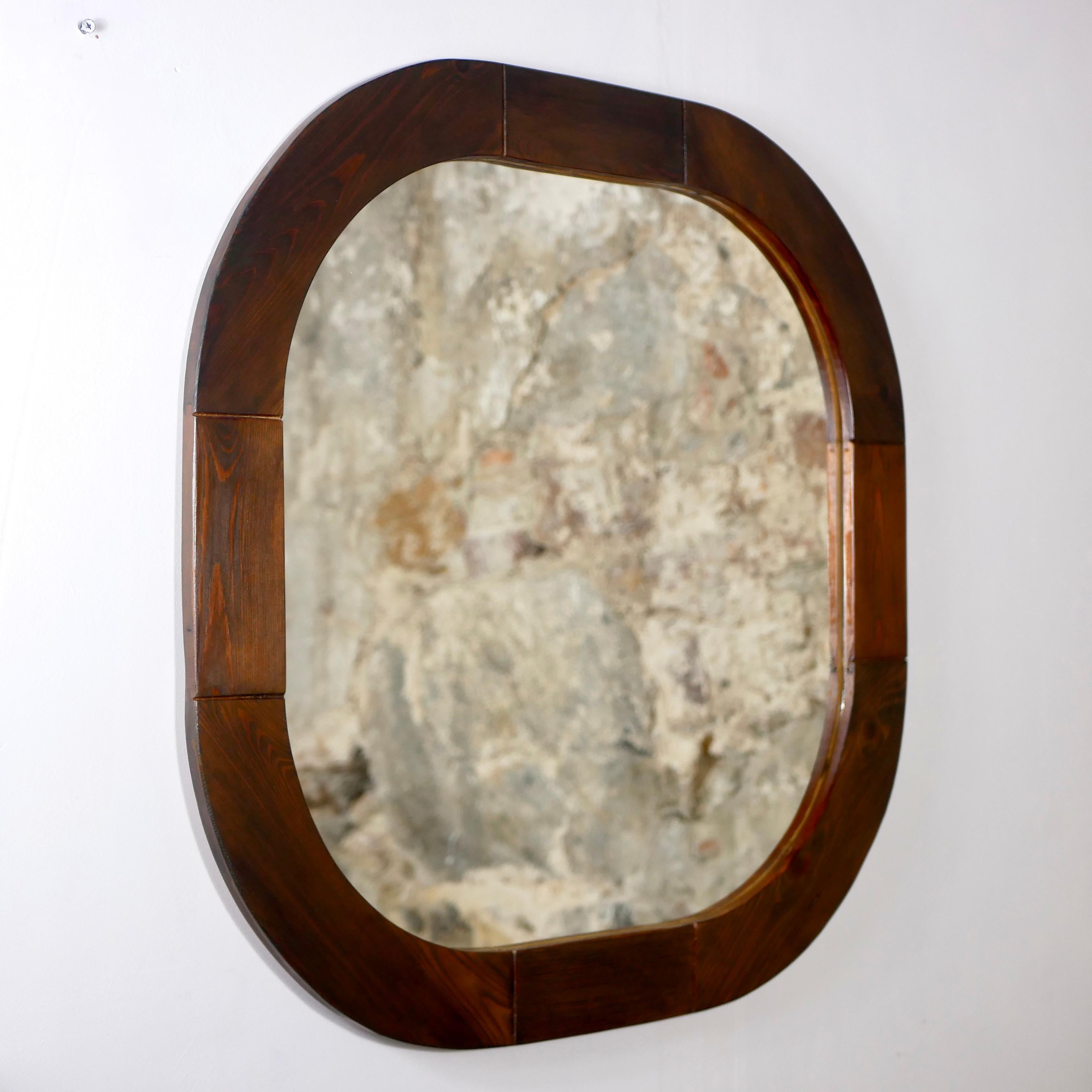 Nice scandinavian mirror in pine, from the 1970s, by Ikea.
Square shaped with rounded edges, nice joinery.
Good condition, has been tinted and varnished.
Small scratch.