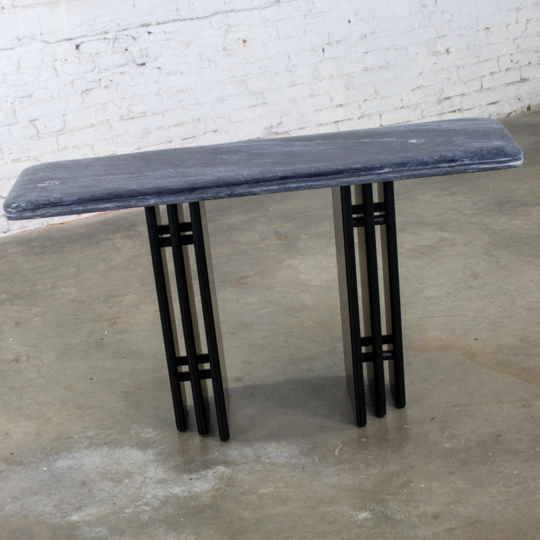 Fabulous Late 20th Century Scandinavian Modern to Postmodern end or side table comprised of a rectangular shaped gray & black Gneiss or marble top with an eased edge & quarter rounded corners & a black lacquered wood double pedestal base