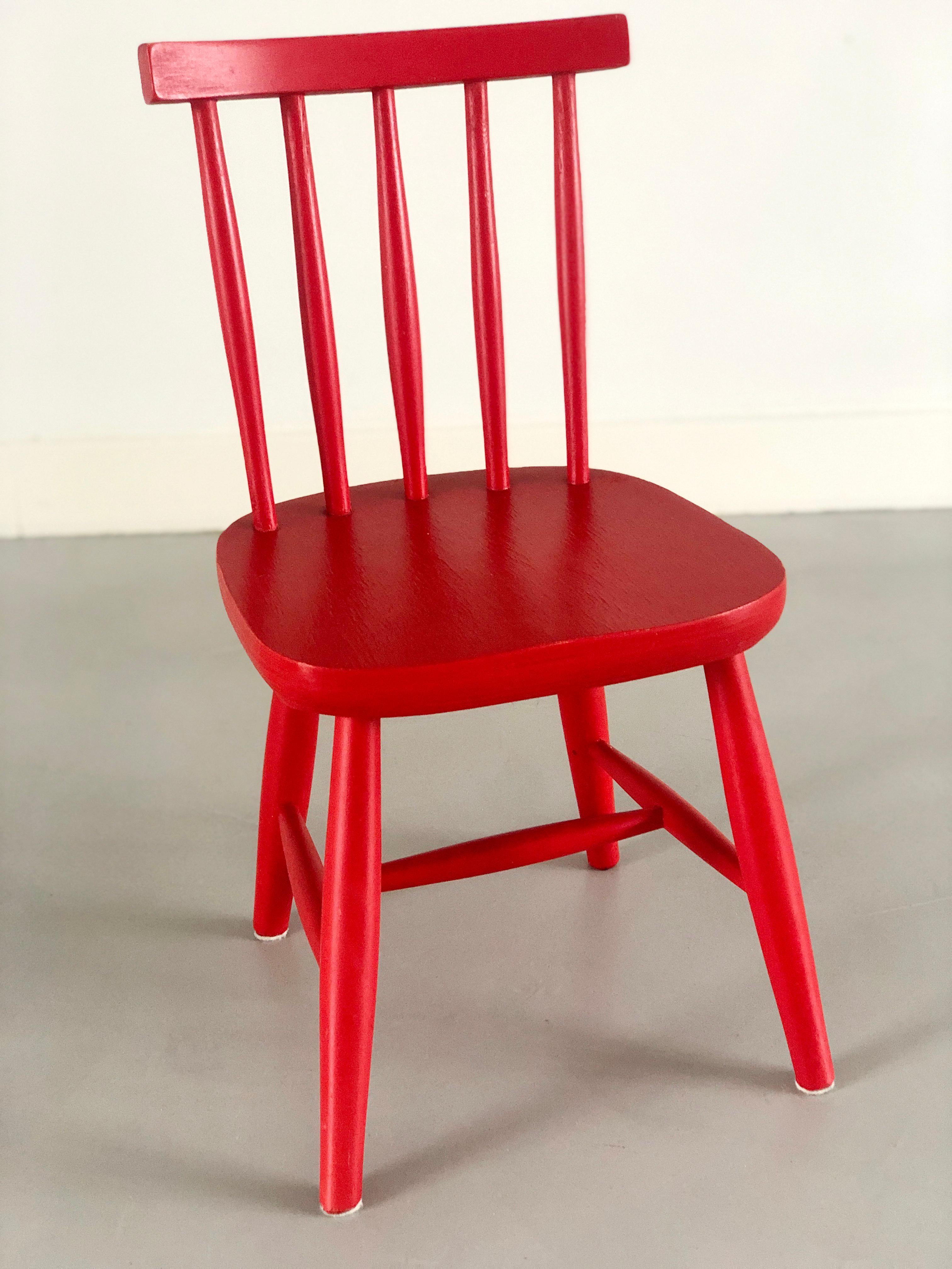 Scandinavian Poul Volther style red wooden child chair 1960's.
Cute vintage red chair from the sixties. 
Possibly by the Danish designer Poul Volther. 
Completely original with beautiful crackle in the paint.