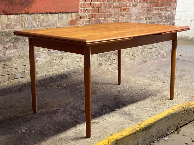 Scandinavian Rectangular Teak Draw Leaf Dining Table For Sale at 1stDibs