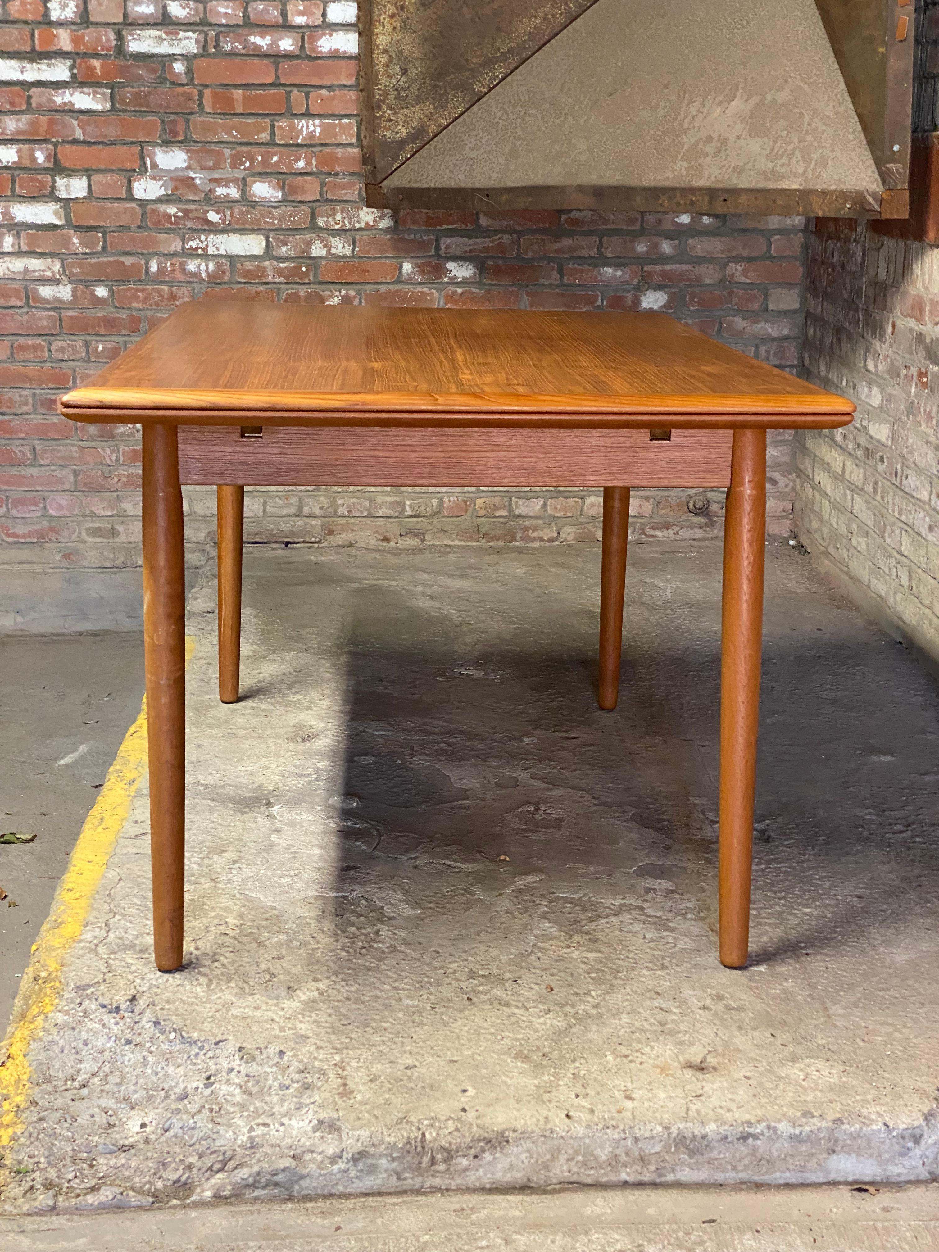 Scandinavian Rectangular Teak Draw Leaf Dining Table In Good Condition In Garnerville, NY