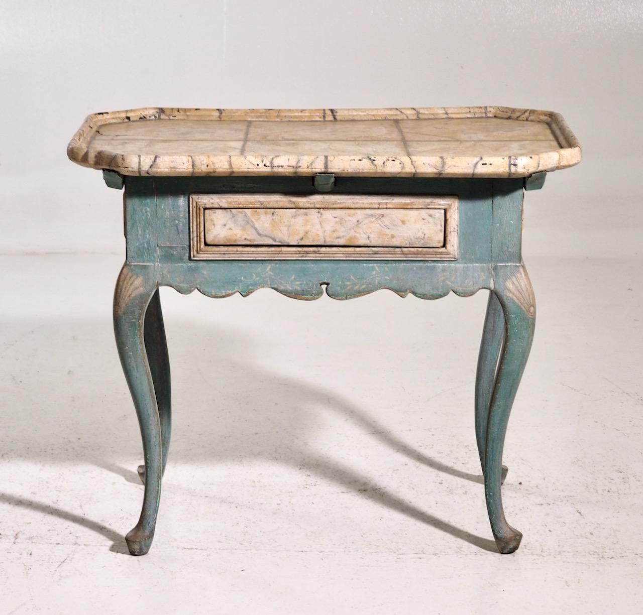 Rare Scandinavian Rococo table in old paint and faux painted marble top, circa 1750.