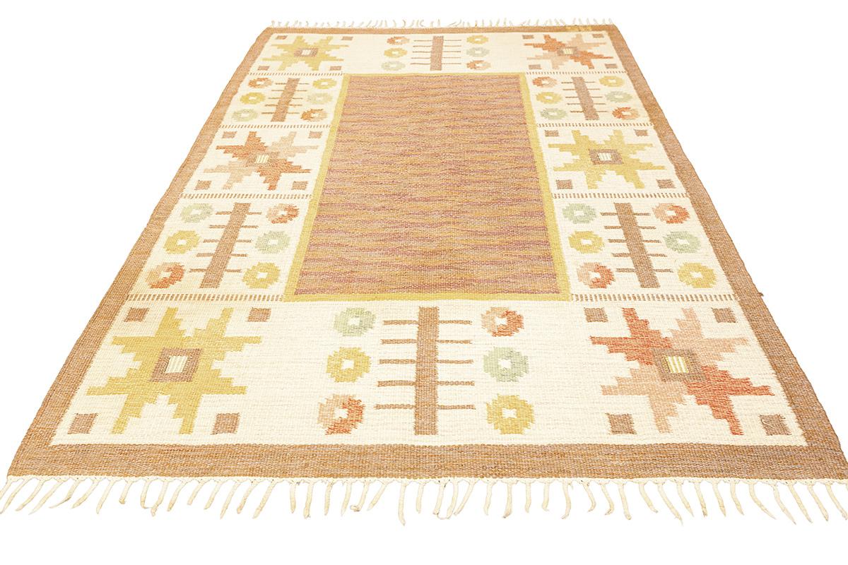 Introducing this enchanting Scandinavian Rug Rollakan, beautifully signed by the artist AS, whose skilled hands have woven a story in wool. This rug is an embodiment of traditional folk art, bringing a touch of the Scandinavian countryside into your