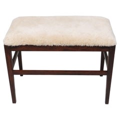 Banc scandinave en bois de rose en peau de mouton