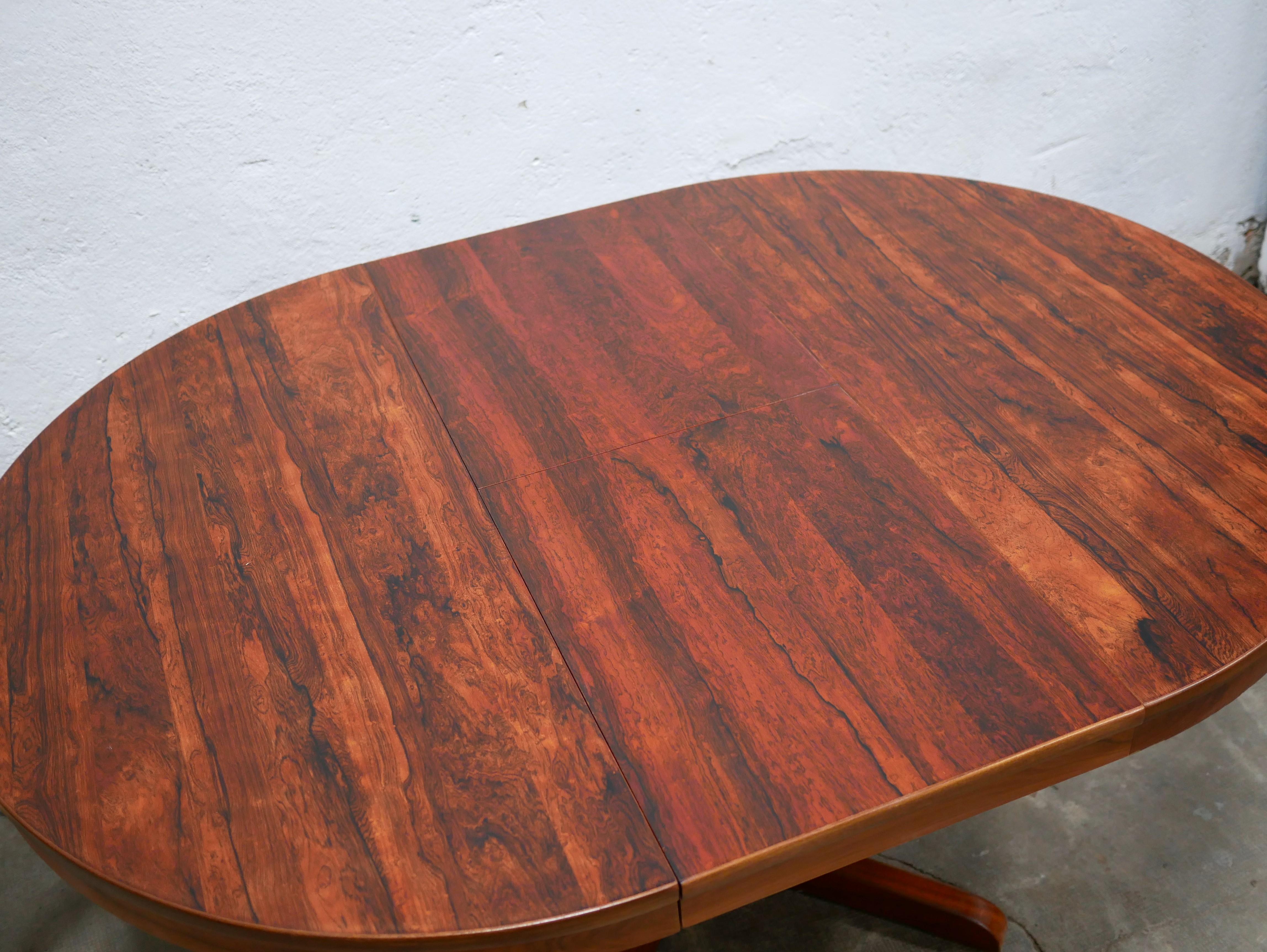 Scandinavian round extendable rosewood dining table 8