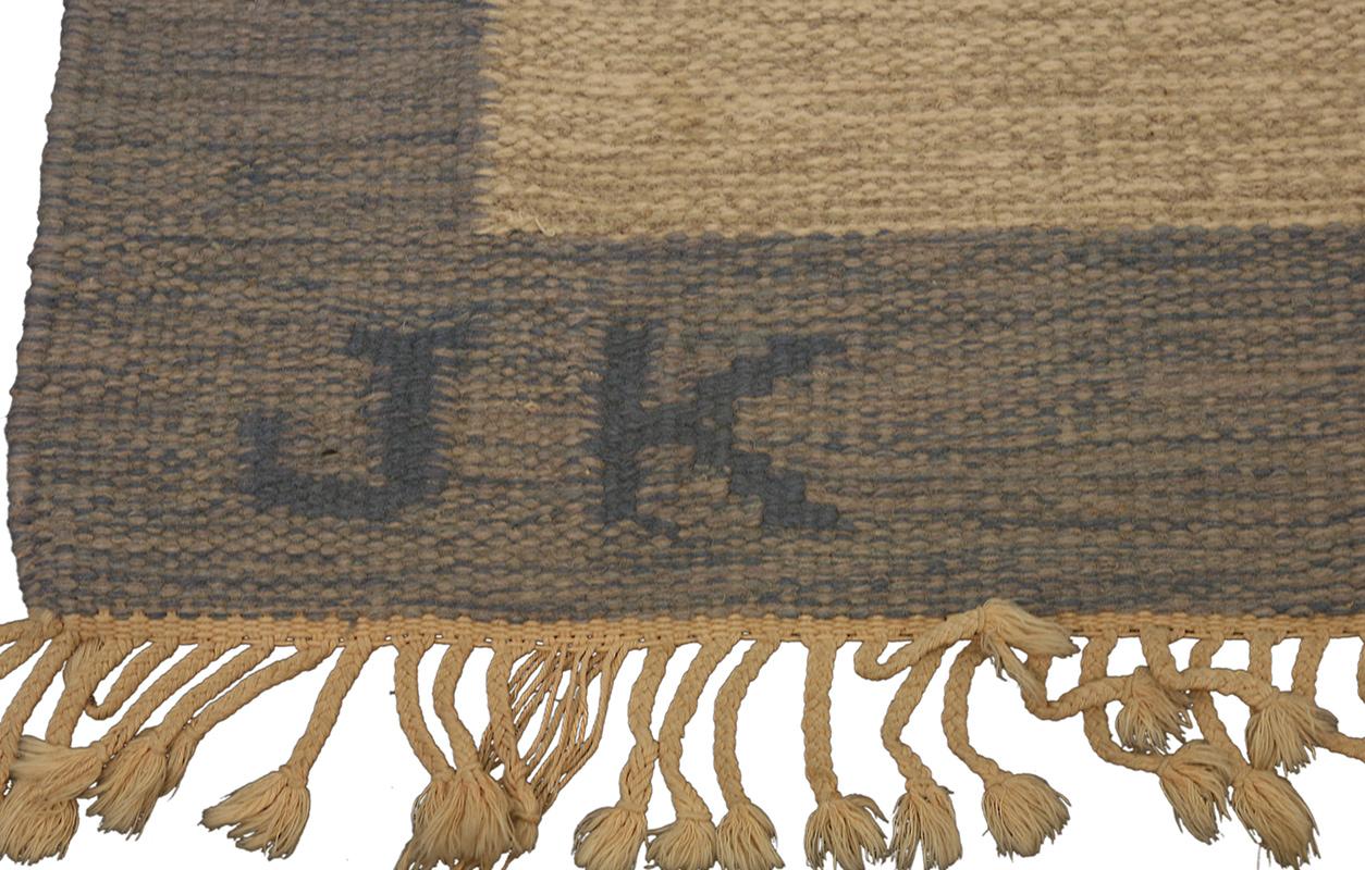 This Scandinavian rug, measuring 200 × 290 cm, is a beautifully handwoven piece that embodies the essence of Nordic craftsmanship and timeless design. Featuring a signature by J.K., this rug carries an artisanal authenticity that highlights the