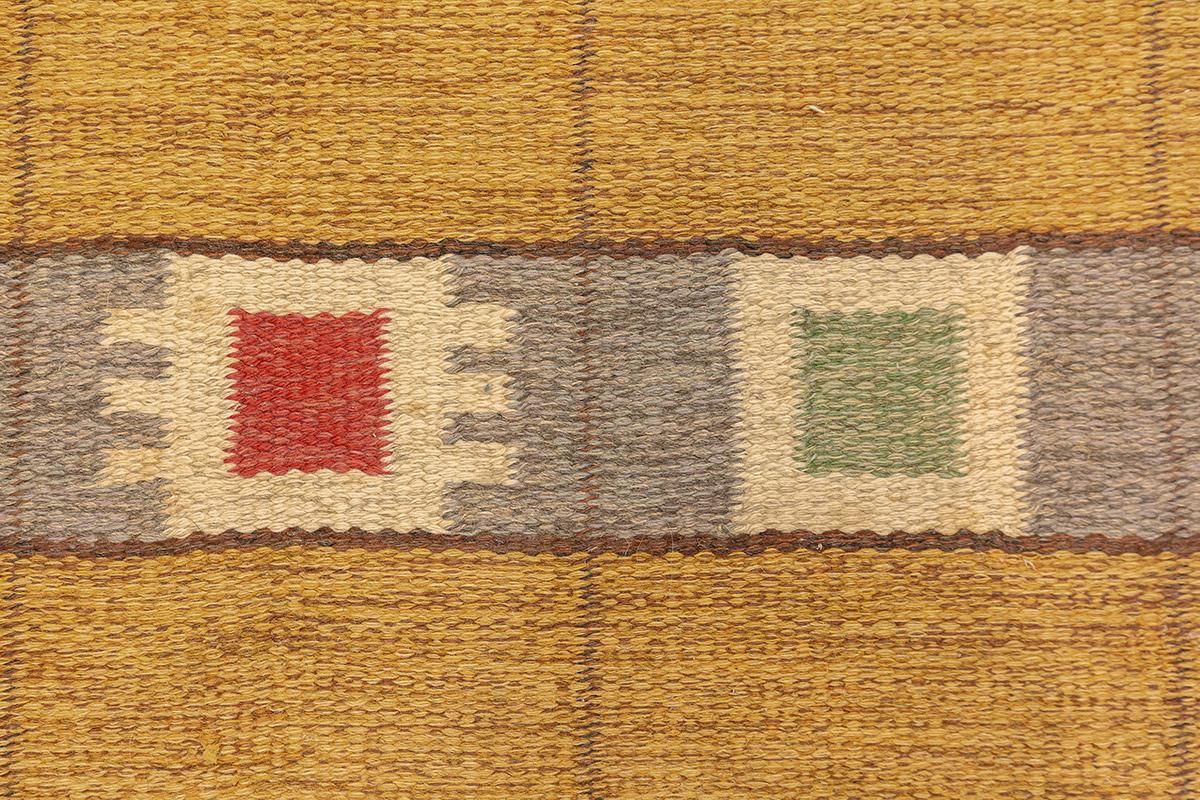 Scandinavian Rug Flat-Weave   239 × 165 cm  Mid-Century Modern

This striking Scandinavian flat-weave rug is a bold statement in mid-century geometric design, showcasing a mustard yellow field structured by precise black gridlines and highlighted