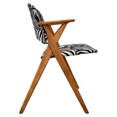 Scandinavian sawbuck chair with armrests, oak and zebra textile, Sweden, 1950s