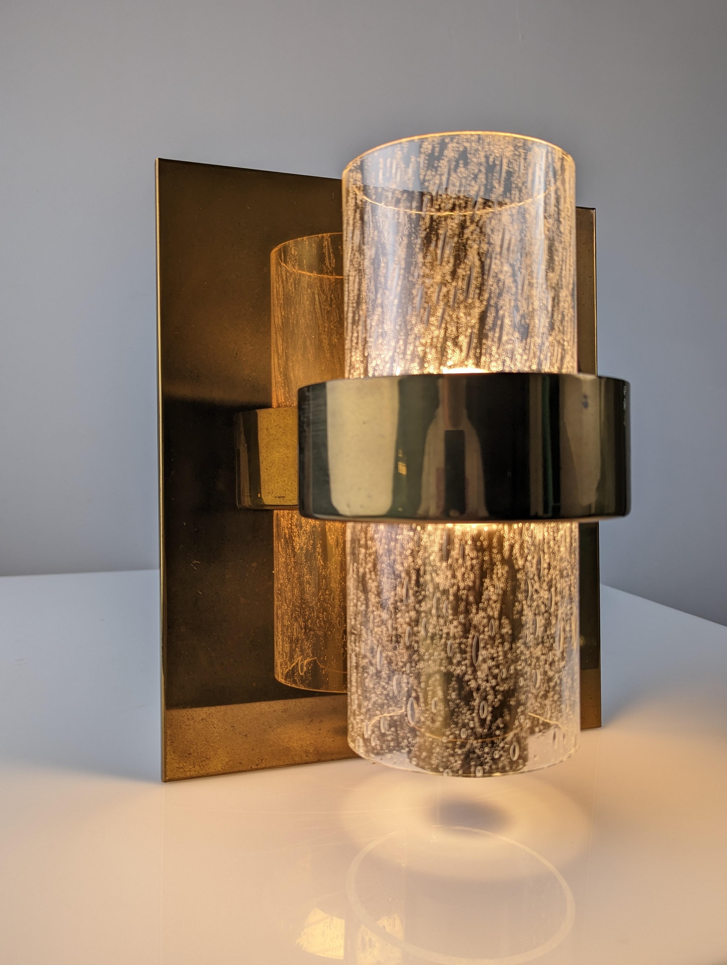 Exceptional wall lamp with brass structure and bubble glass shade. Designed by Jonas Hidle and made in Norway by Høvik Lys AS from the second half of circa 1970. Shades are probably made by Hadeland Glassverk AS.