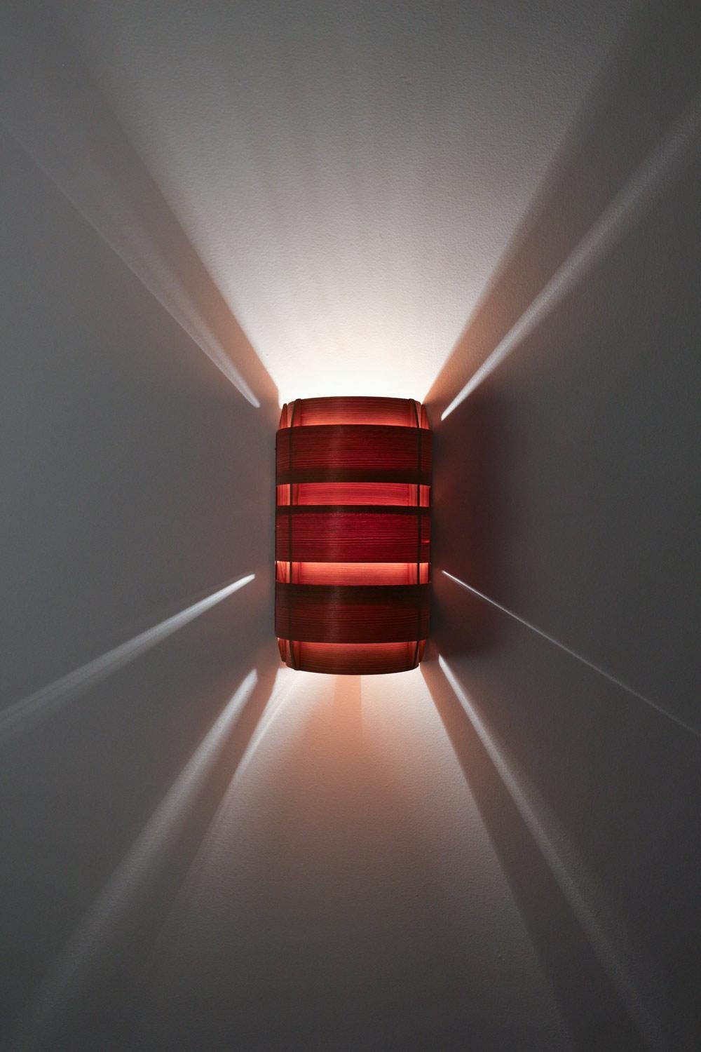 Beautiful wall lights by Swedish master Hans-Agne Jakobsson.
The lamps consists of a copper plate with pine lamellae, giving a stunning soft light when lit up.
Condition: Very good condition with light signs of use and age.