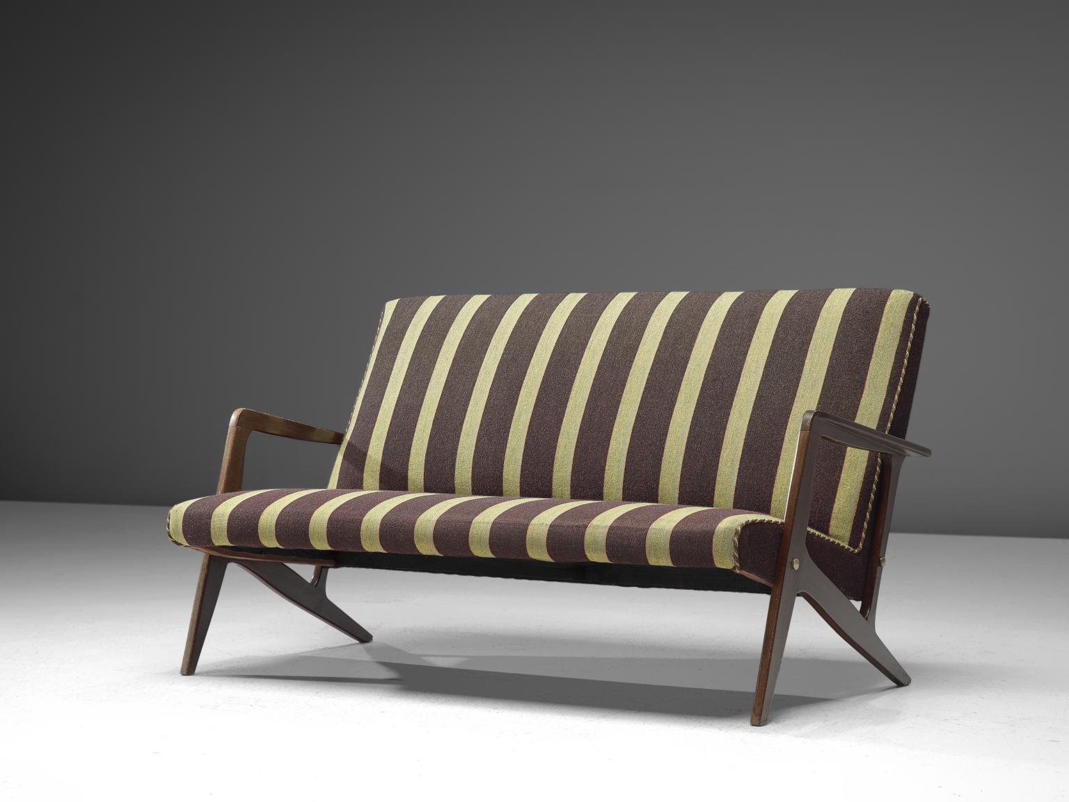 Sofa, stained wood and green fabric, Scandinavia, 1950s. 

Small reclining sofa with organic shaped wooden base. The eye catching element is the wooden, almost branch-like frame. This organic shaped frame splits into two legs at the end of the