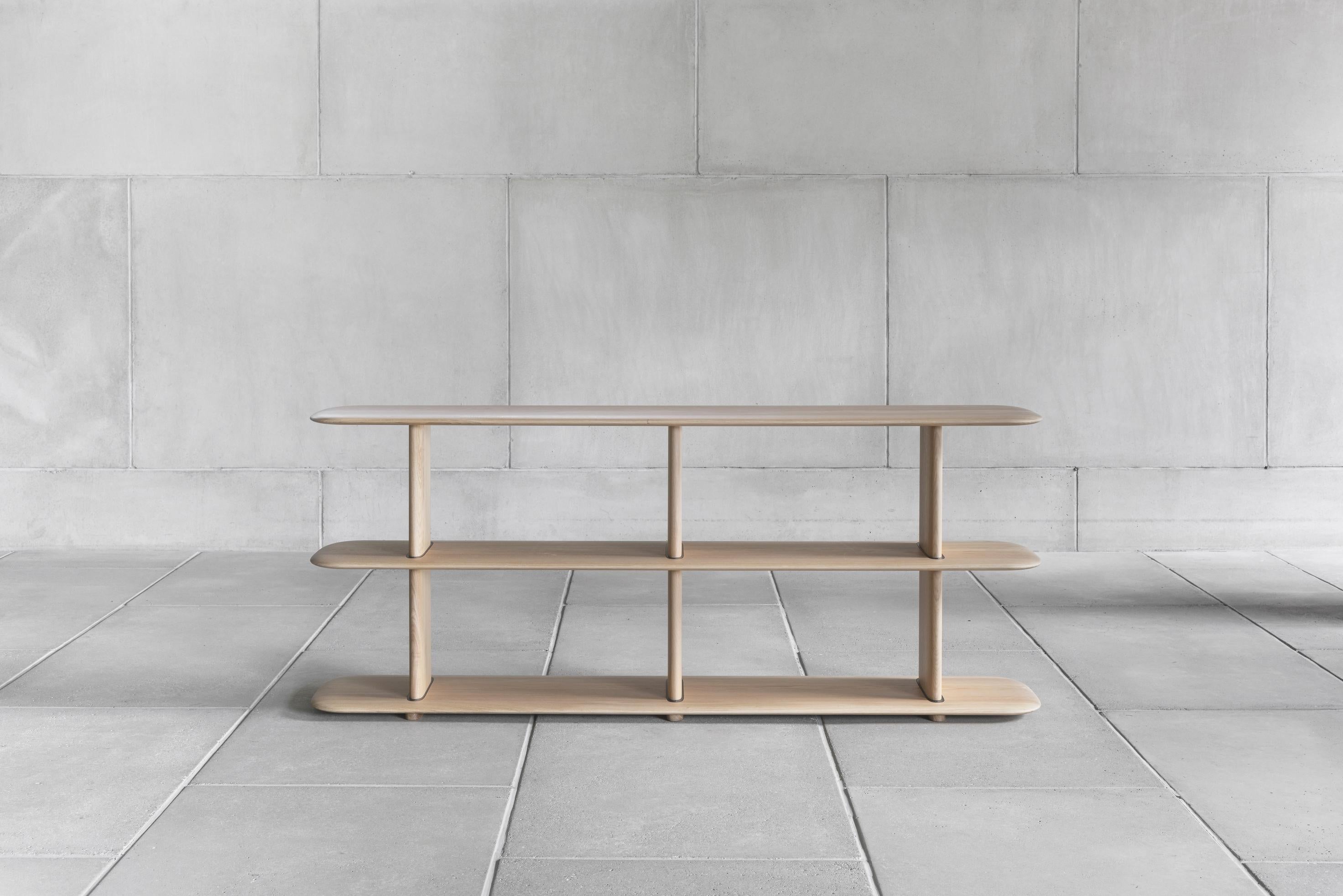 Shelf POEME 
Designed by Poiat Studio, 2022

Dimensions : W. 181 x H. 74 x D. 37.5 cm

Model shown :
- Color natural oak 

Graceful and poetic, yet robust, the Poeme Shelf comes in four different sizes, offering a flexible solution for diverse