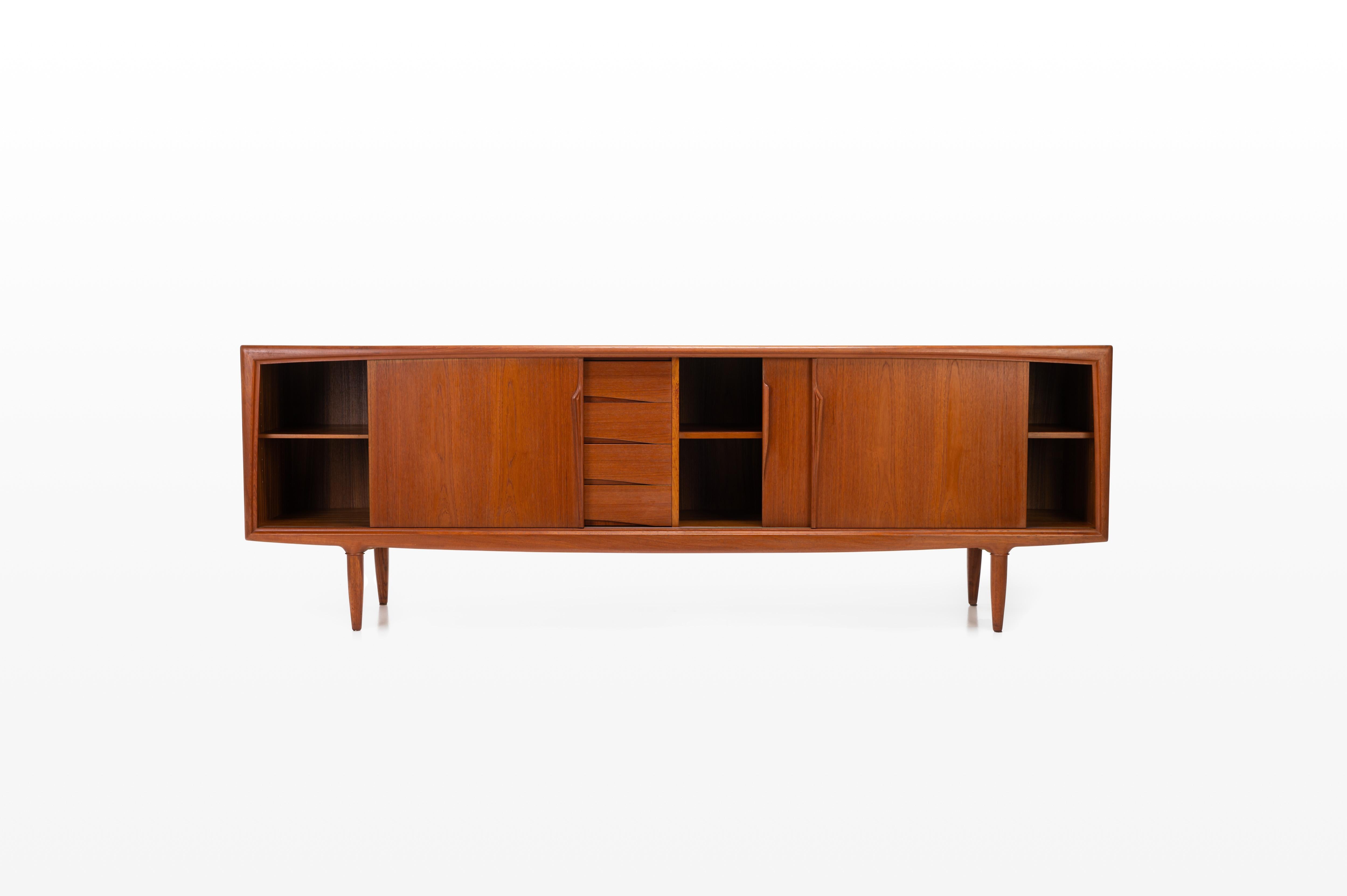 Produced by Axel Christensen Odder (ACO Møbler) and designed in the 1960s. Beautifully designed sideboard with elegant handles, four drawers and plenty of storage space with adjustable shelves.