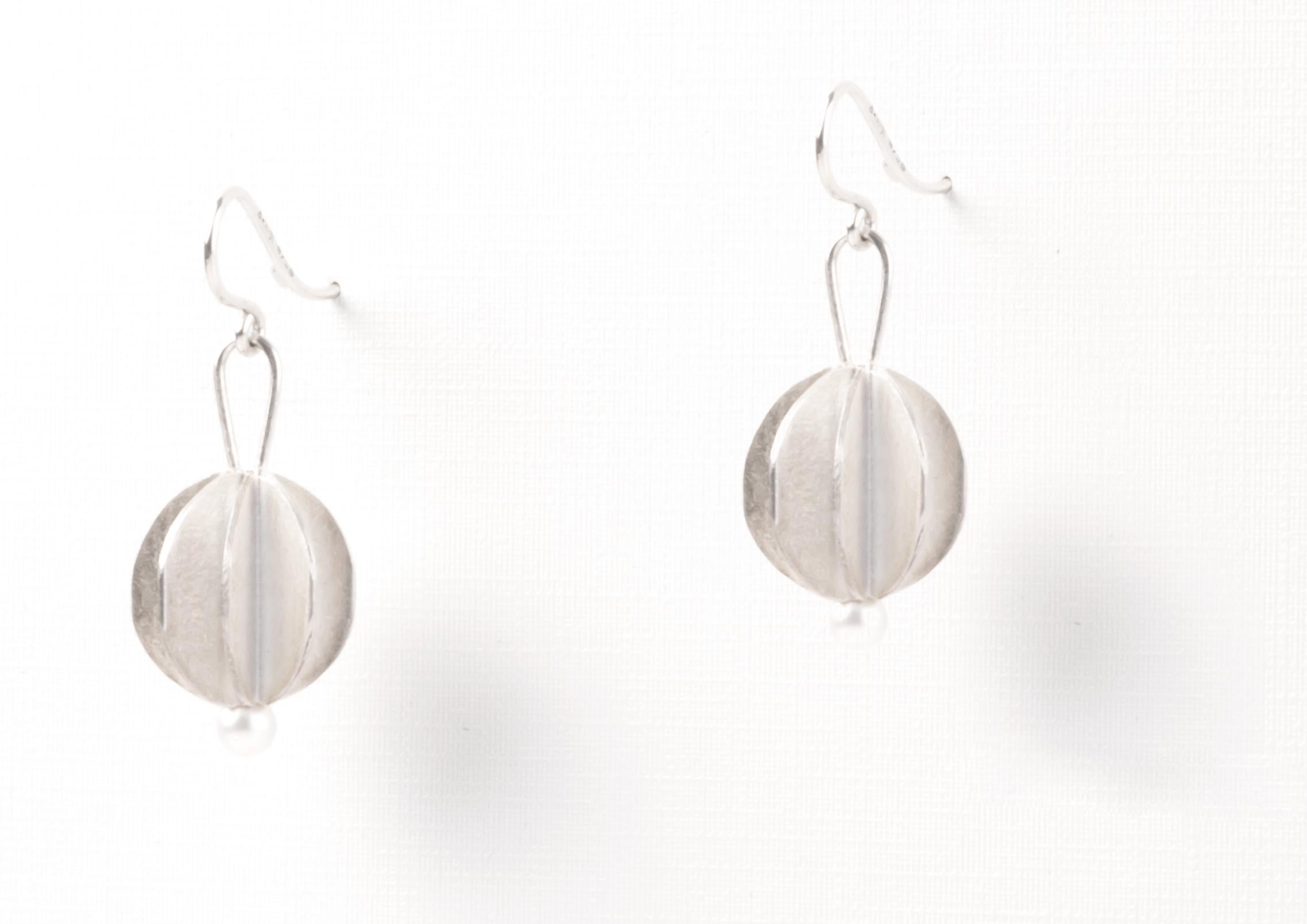 Wonderful and decorative pair of silver and pearl earrings. Designed and hand made in her studio by silversmith Åse-Marit Thorbjørnsrud. Both earrings are in excellent condition. Quoted price is for the pair. 
