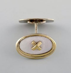 Orfèvre scandinave, paire de boutons de manchette en argent doré de style Art déco
