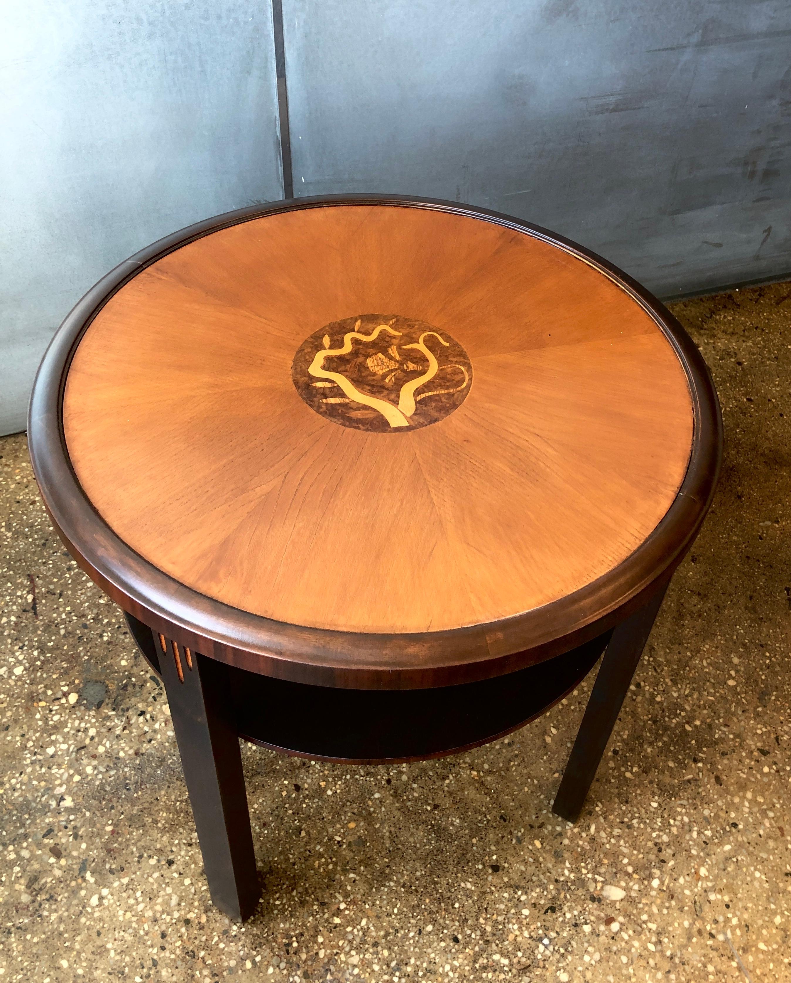 Swedish Grace style Scandinavian side table. Stained wood with inlay on table top. Circa 1930th.
Recently refinished.