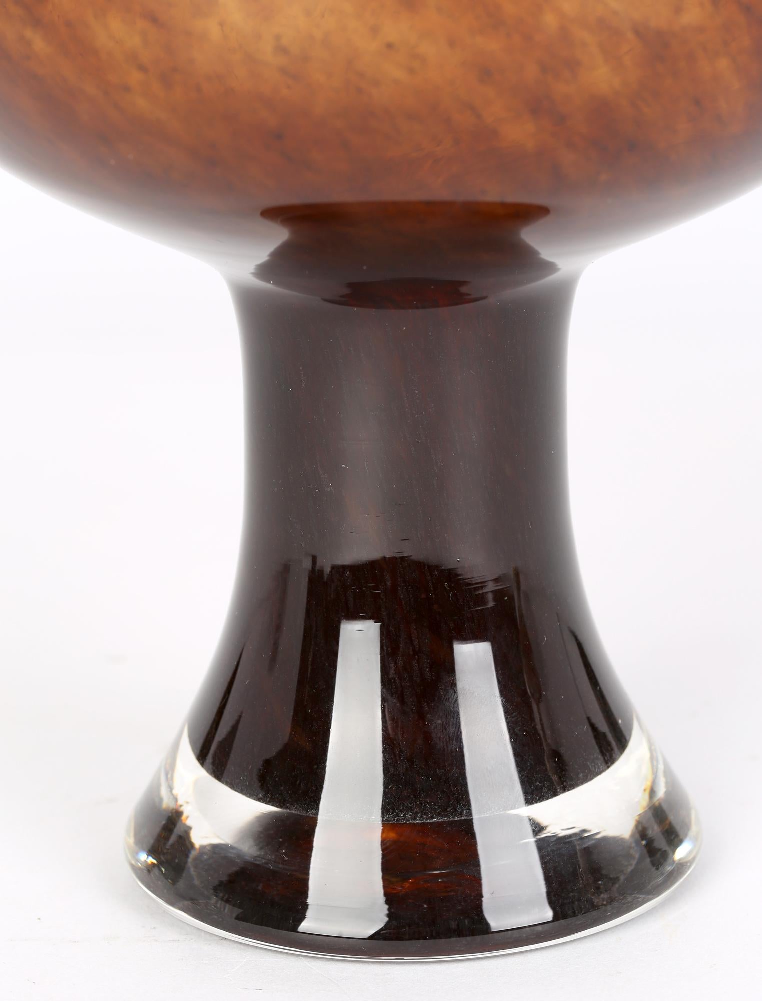 A stylish Scandinavian, space age inspired, hand blown art glass vase in mottled brown and clear glass probably dating from around the 1960’s. Possibly by Norwegian glass makers Hadeland this impressive vase stands on a hollow narrow pedestal foot