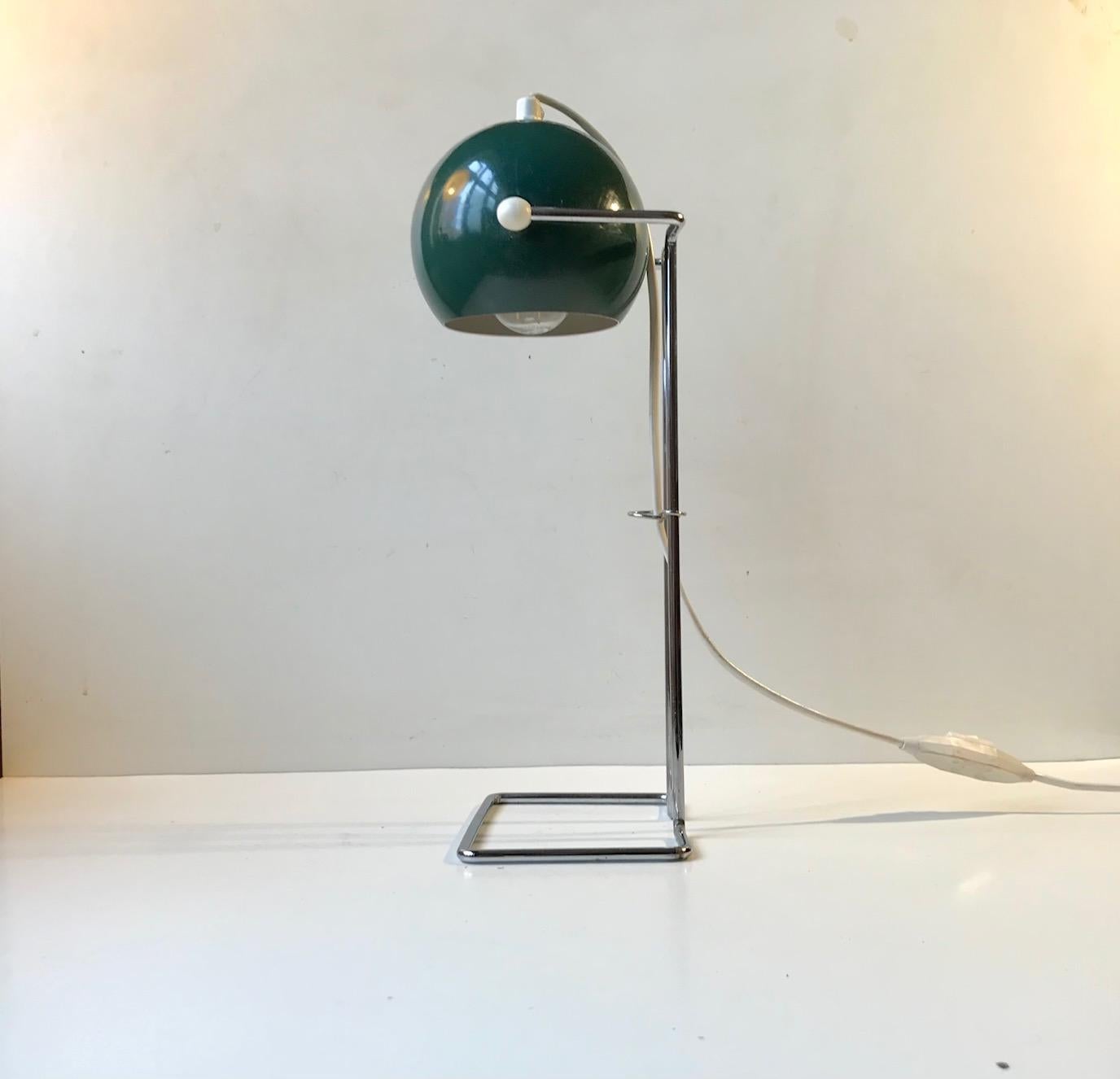 Rare grass green colored table light from E. S. Horn in Denmark. Designed and manufactured during the mid-late 1960s in a style reminiscent of Verner Panton. Its adjustable by the shade up/down, has a chrome plated steel string base, white