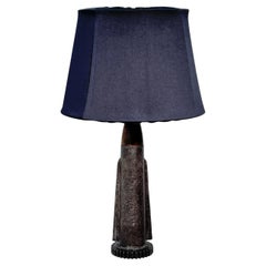 Scandinavian space age themed brutalist table lamp made from cast iron and oak