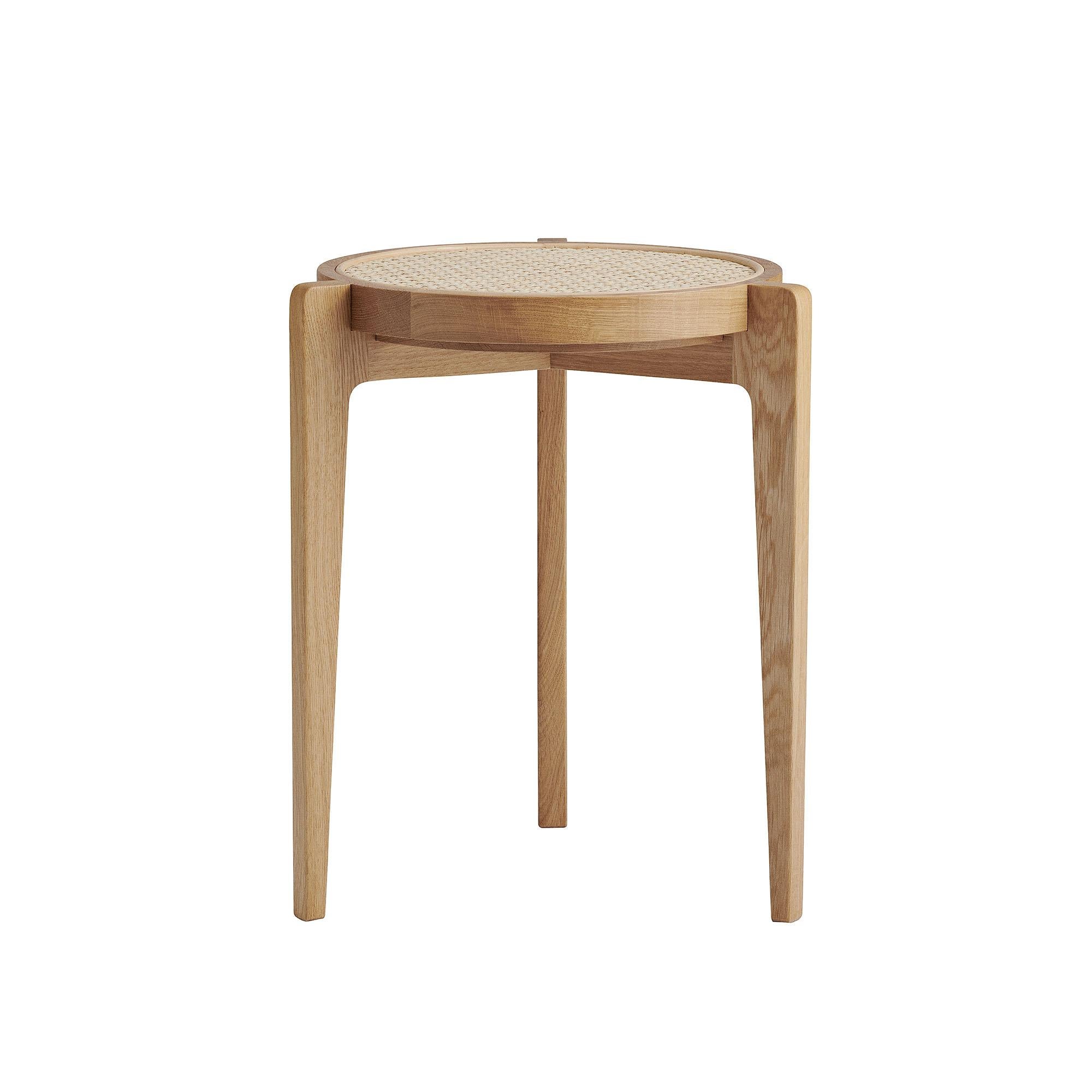 'Le Roi' Stool by Norr11

Dimensions :
Diameter: 36 cm
Height: 44 cm

Model shown on the picture:
Color: natural oak
Natural French Rattan

---
The Le Roi Coffee Table is constructed as a frame geometry of solid oak, with
inlaid natural French