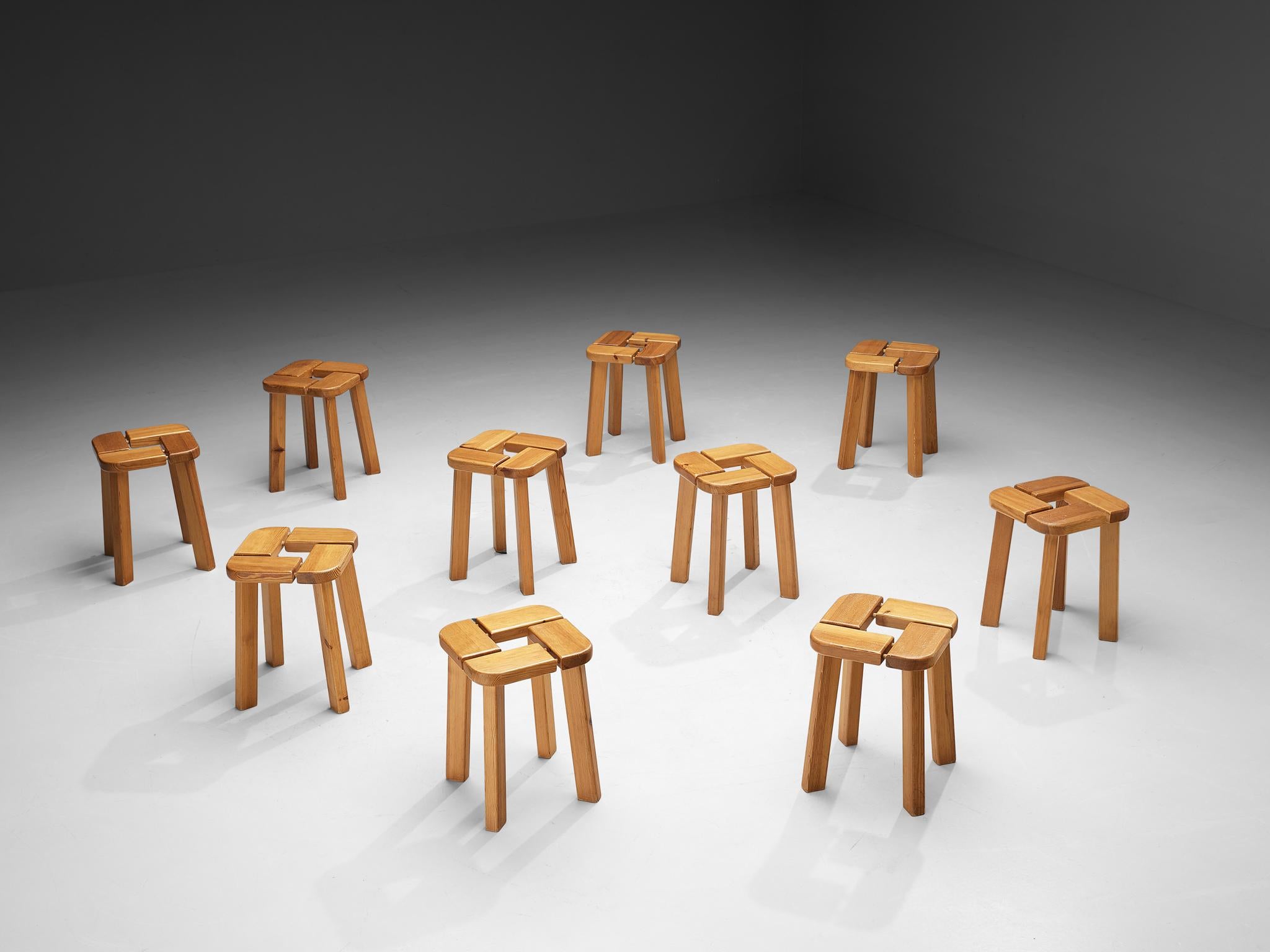 Stools or side tables, pine, Scandinavia, 1970s

This beautiful set of stools, crafted from natural pine wood, showcases a striking combination of geometric shapes and a rich, patinated finish that speaks to its age and character. The cut-out