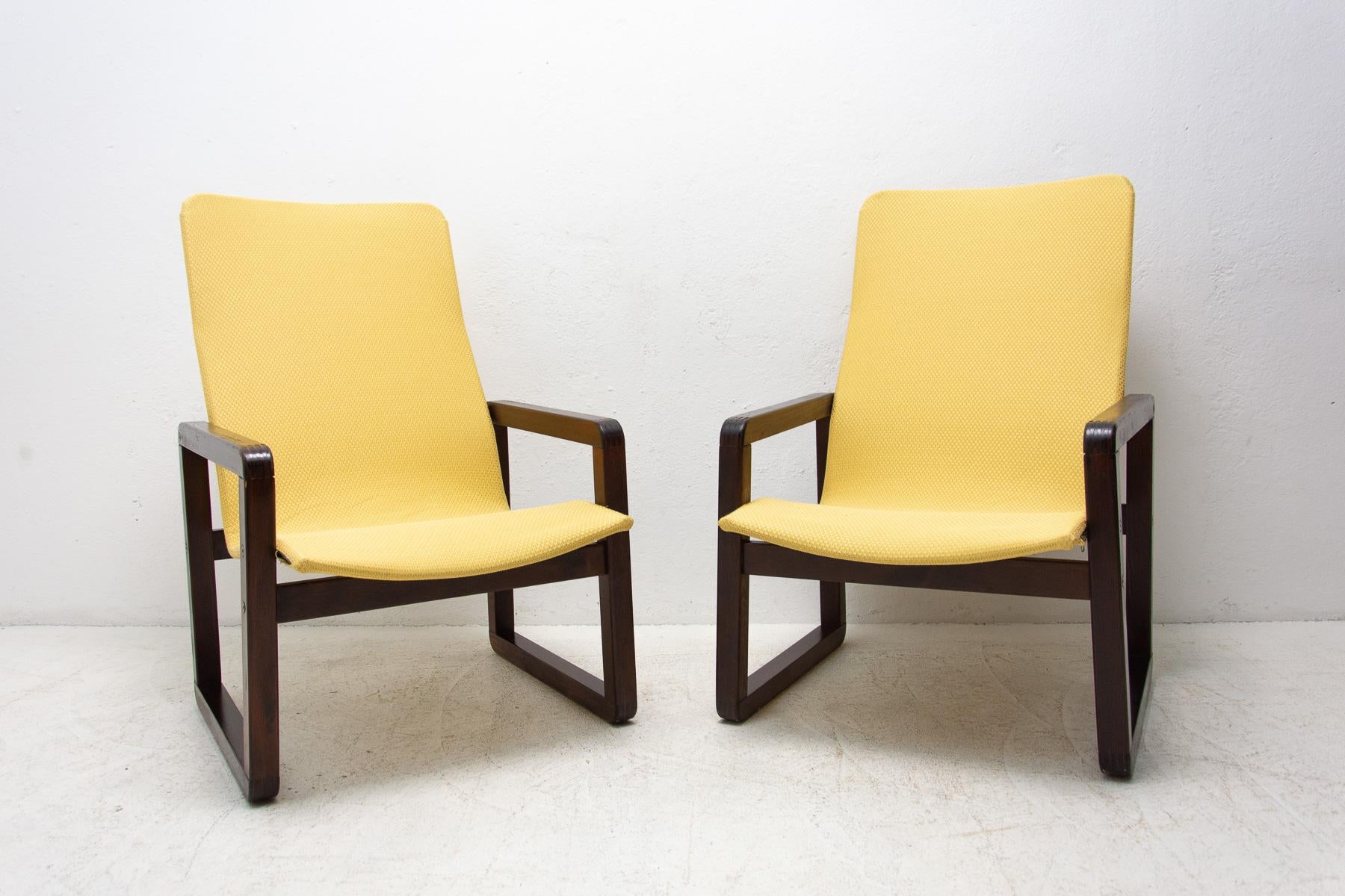 Vintage scandinavian style armchairs, made in the 1980's in the former Czechoslovakia. The structure is made of beech wood, the chairs have a new fabric placed on the wooden seats. In very good Vintage condition, showing slight signs of age and