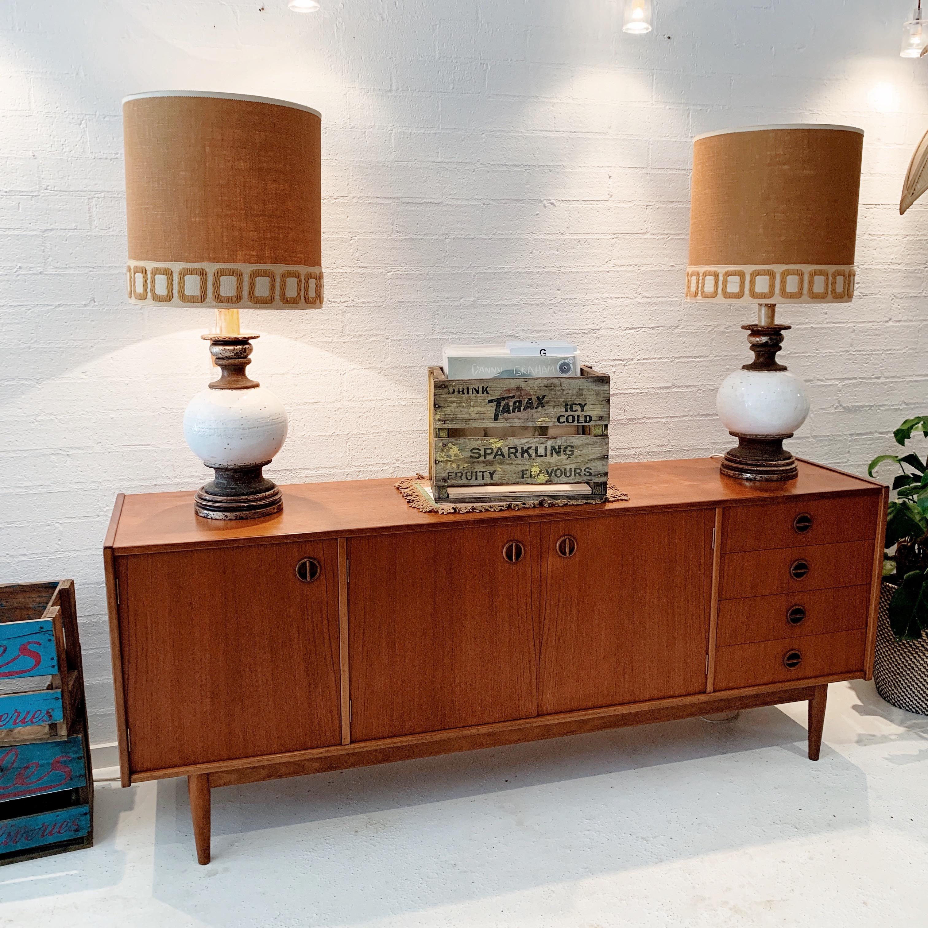 Immaculate! Scandinavian style, Australian modern, 1960s Parker Furniture teak sideboard. Carefully restored in house. 
This is one of the acclaimed, early 1960s “Nordic Collection”. 3 door, 4 drawer, beautifully marked, with the original, classic