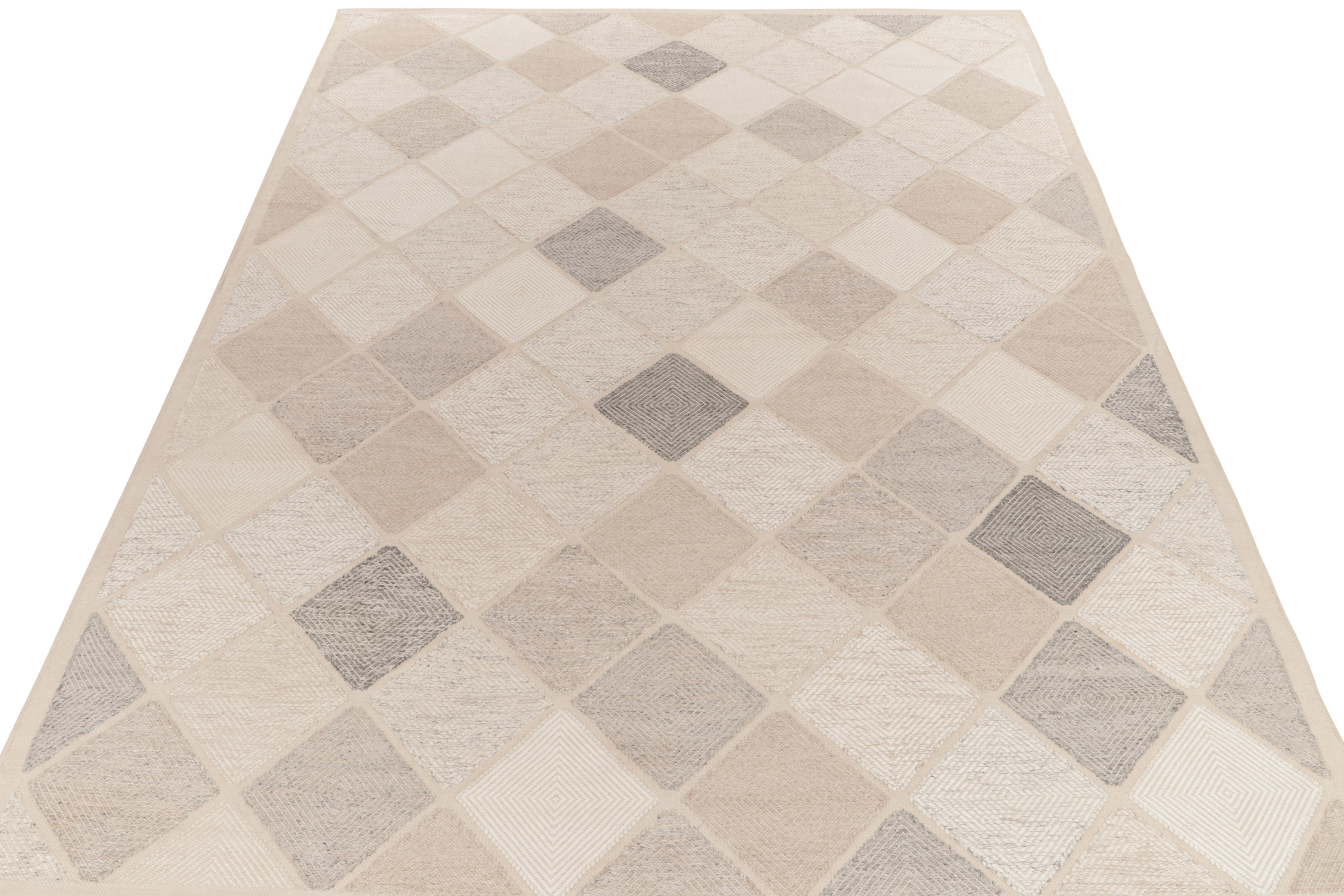 Rug & Kilim presents this exquisite 11x14 Scandinavian kilim from the Morocco line of the award-winning flat weave texture. The handwoven piece flows in an all over half diamond pattern in a delightful blend of beige, stone blue, grey & white. The