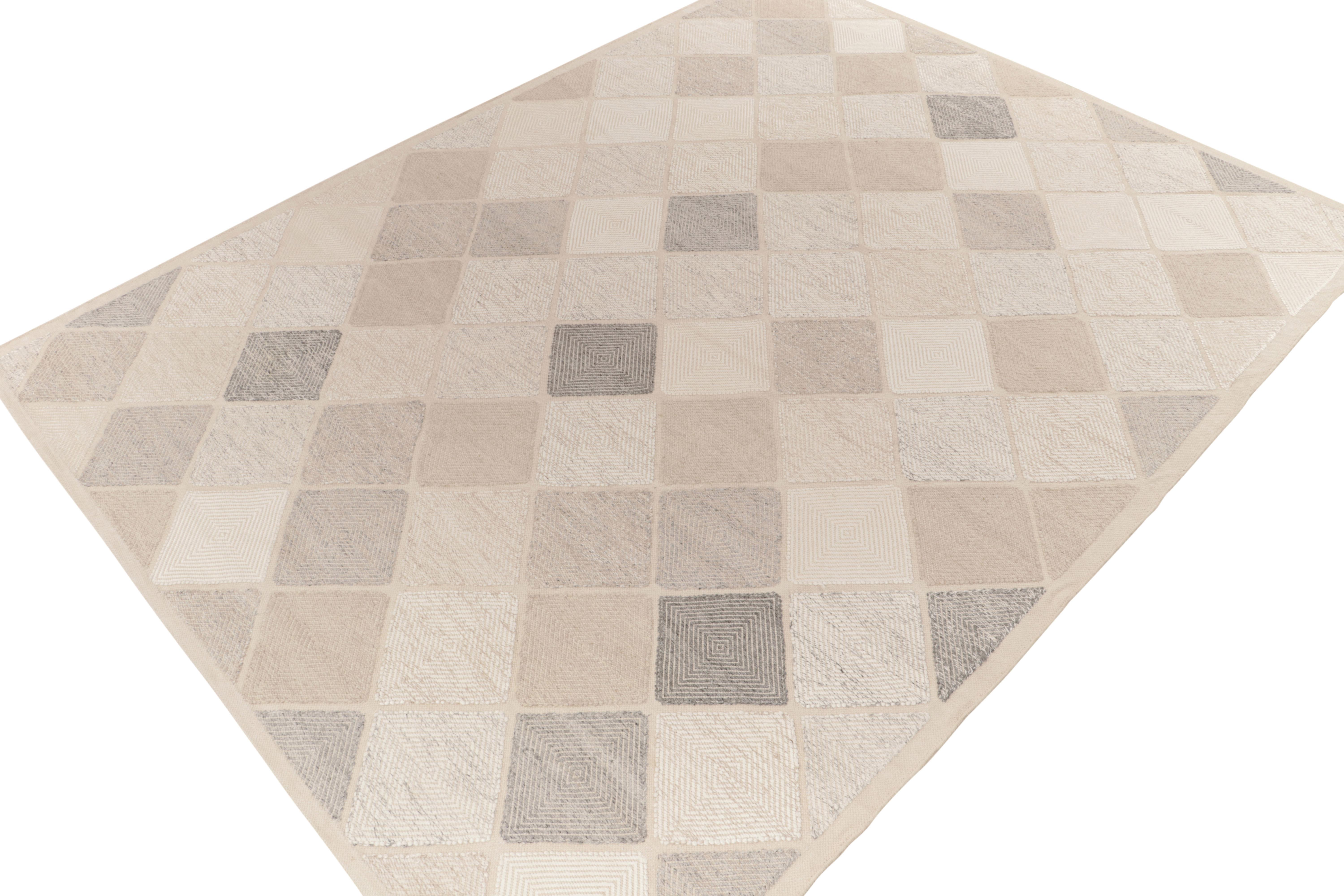 Rug & Kilim presents this exquisite 6x9 Scandinavian kilim from the Morocco line of the award-winning flat weave texture. The handwoven piece flows in an all over half diamond pattern in a delightful blend of beige, stone blue, grey & white. The