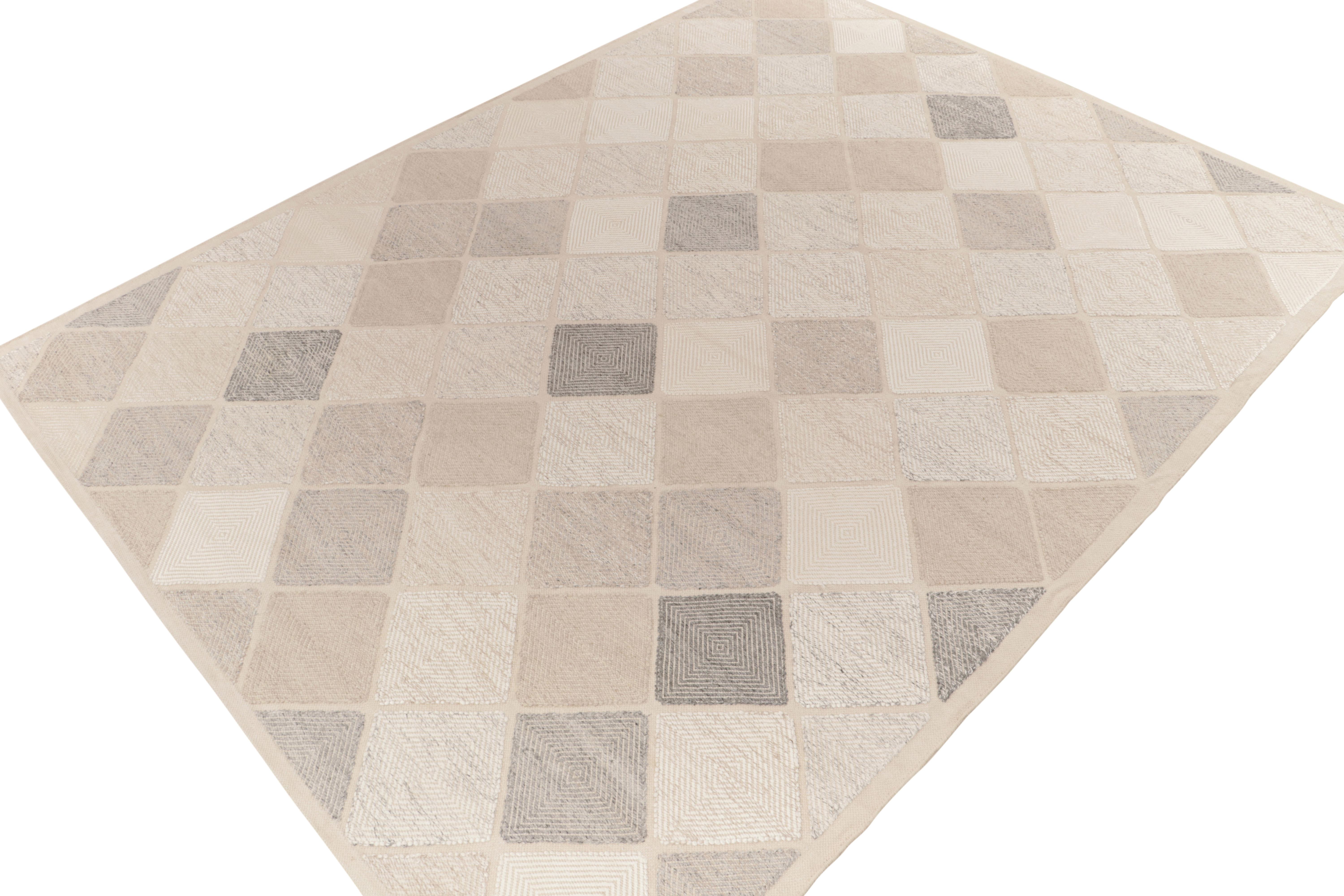 Rug & Kilim presents this exquisite 9x12 Scandinavian kilim from the Morocco line of the award-winning flat weave texture. The handwoven piece flows in an all over half diamond pattern in a delightful blend of beige, stone blue, grey & white. The