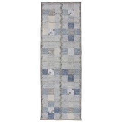 Tappeto a trama piatta in stile scandinavo con disegno a scacchiera in grigio e blu